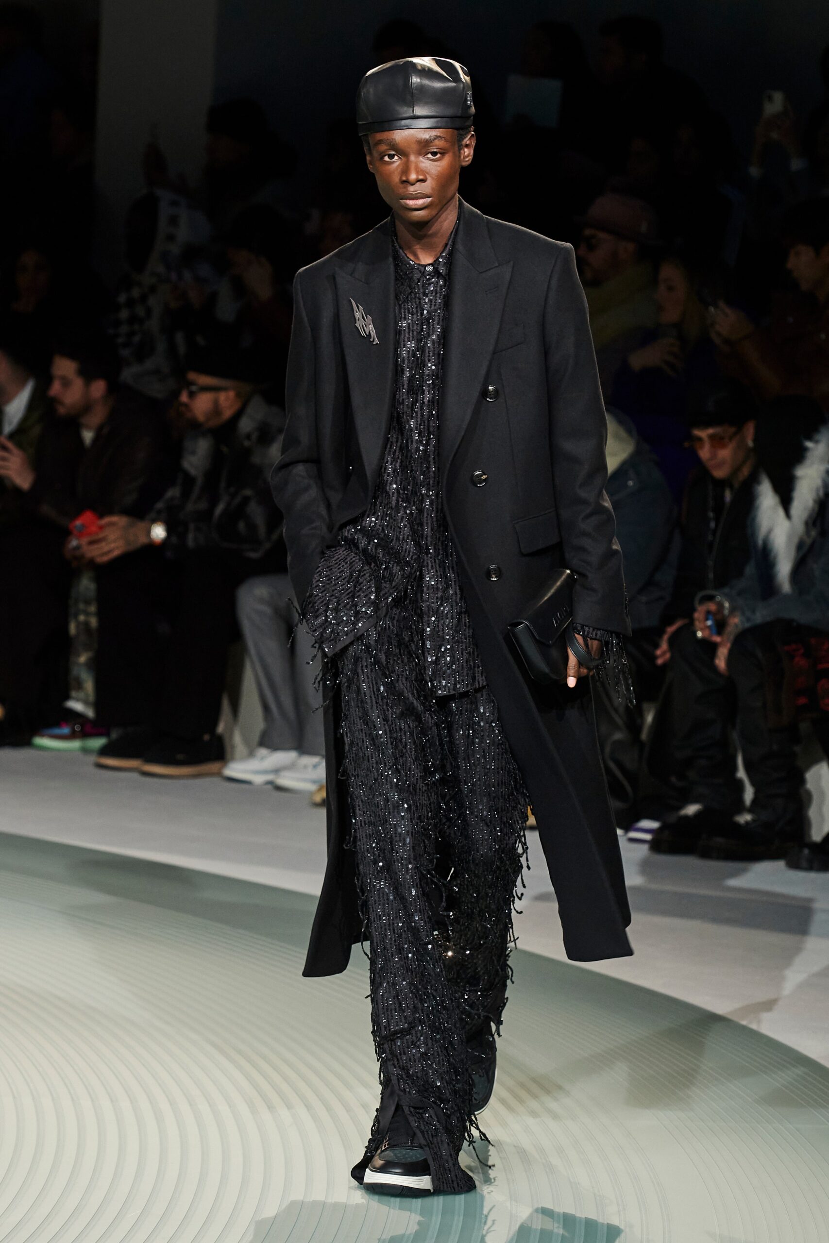 black tailored coat with fringed shirt