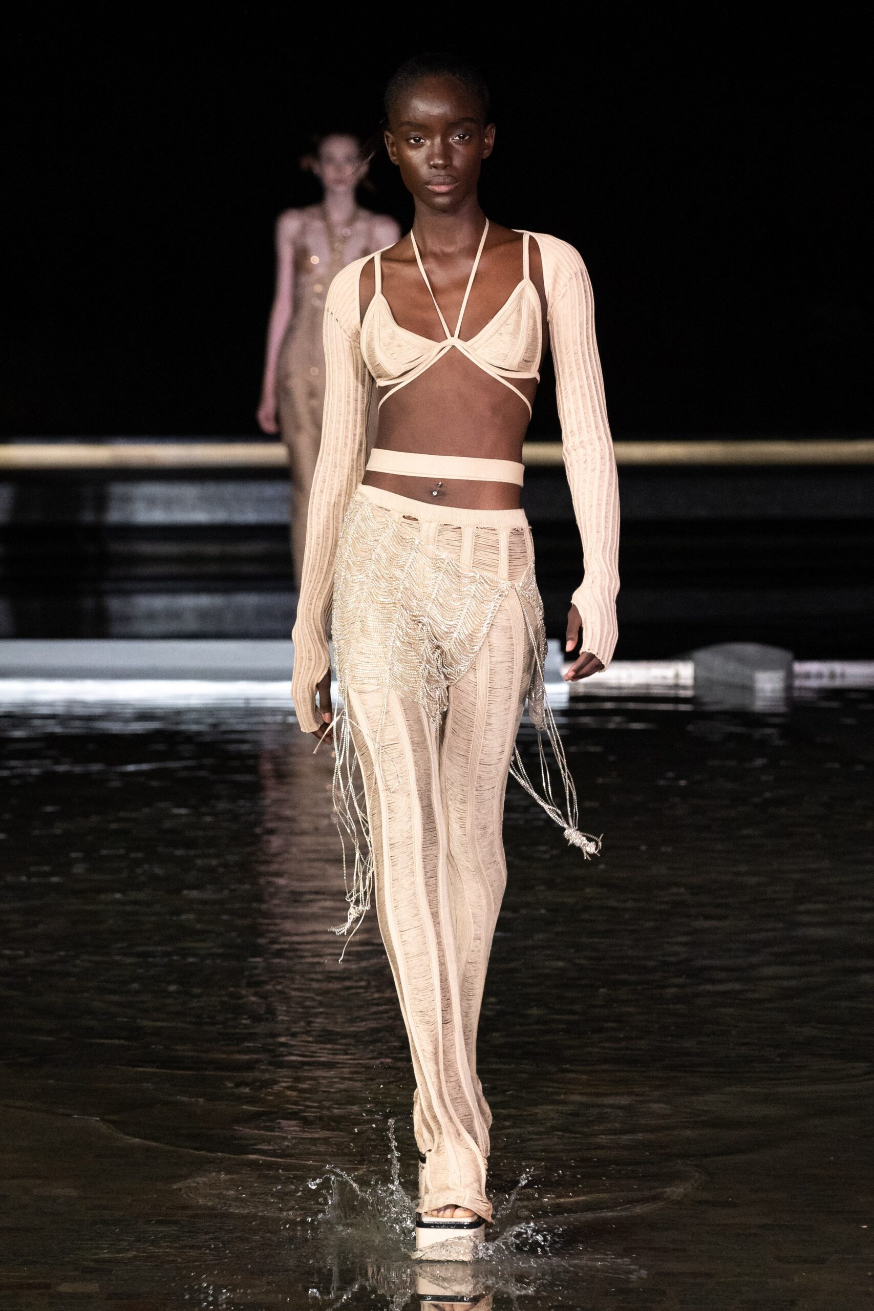beige fitted knit top and pants