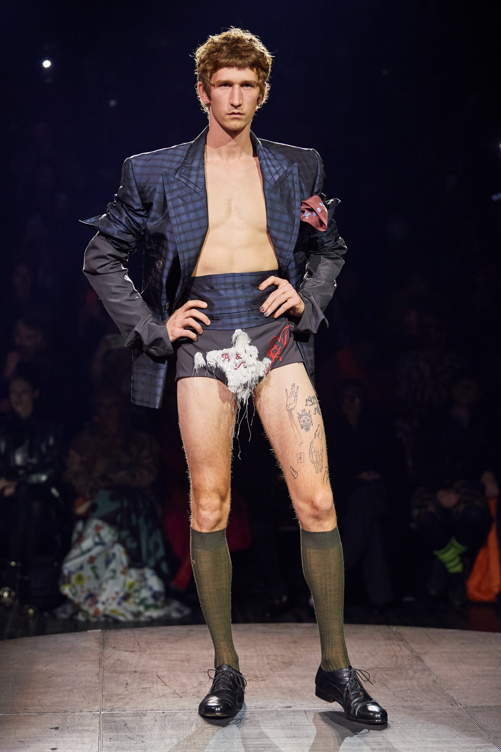black tailored blazer with fitted shorts