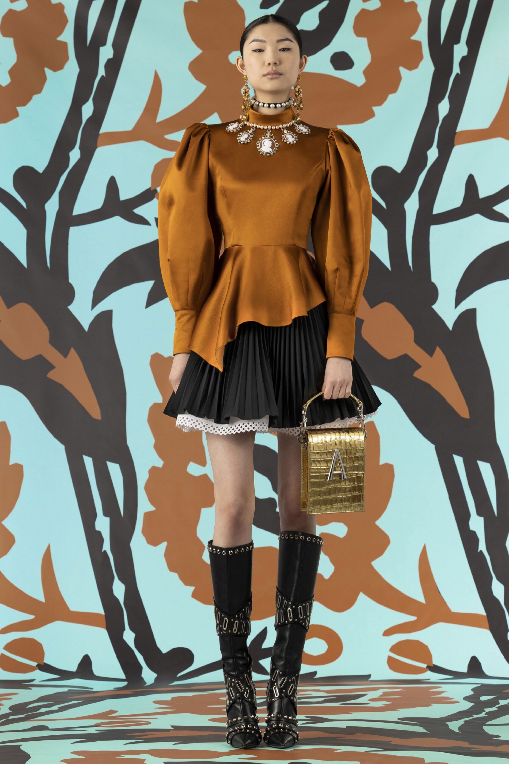 orange silk fitted top with pleated skirt