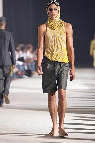 yellow silk tank-top with gray shorts