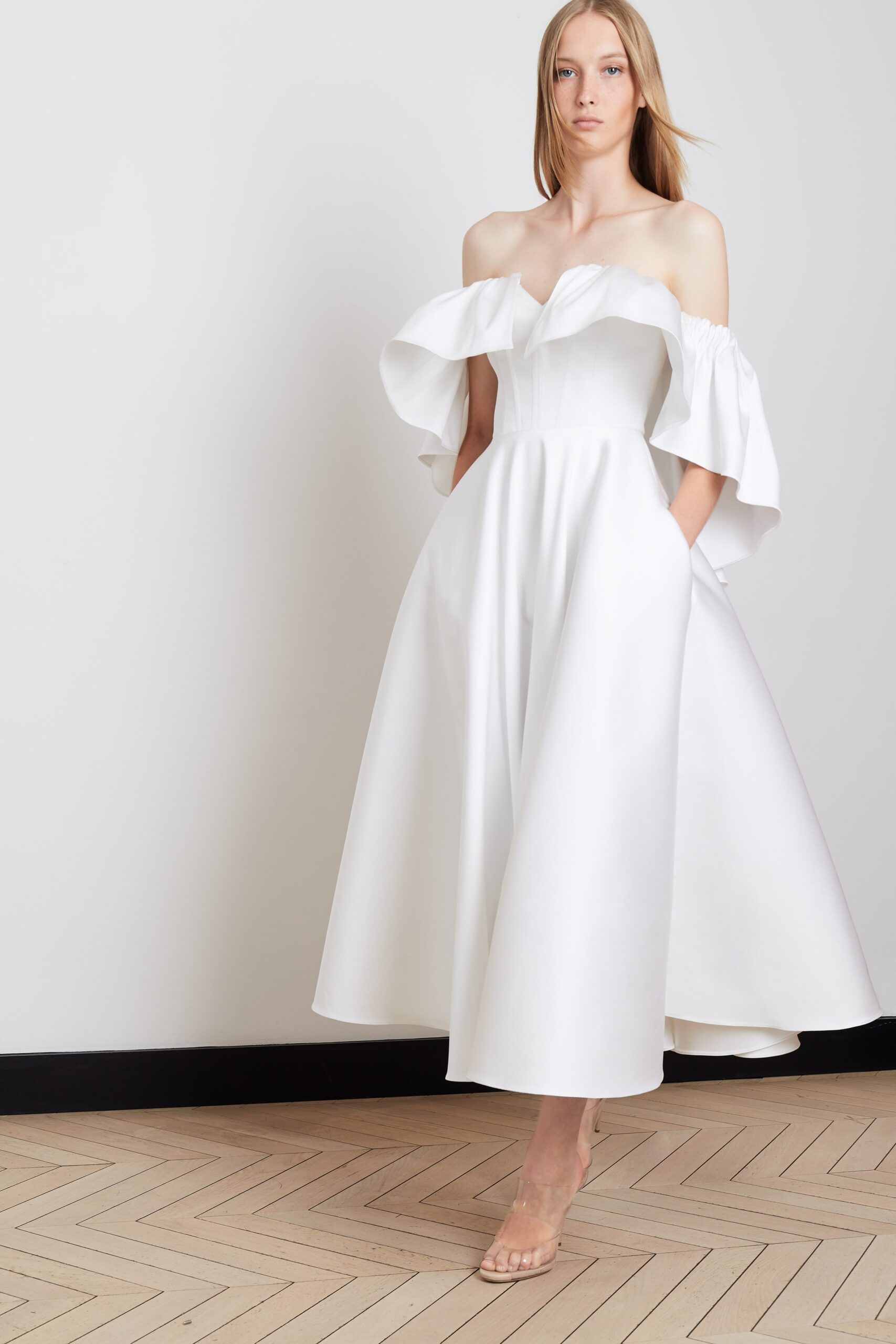 white off-shoulder pleated dress