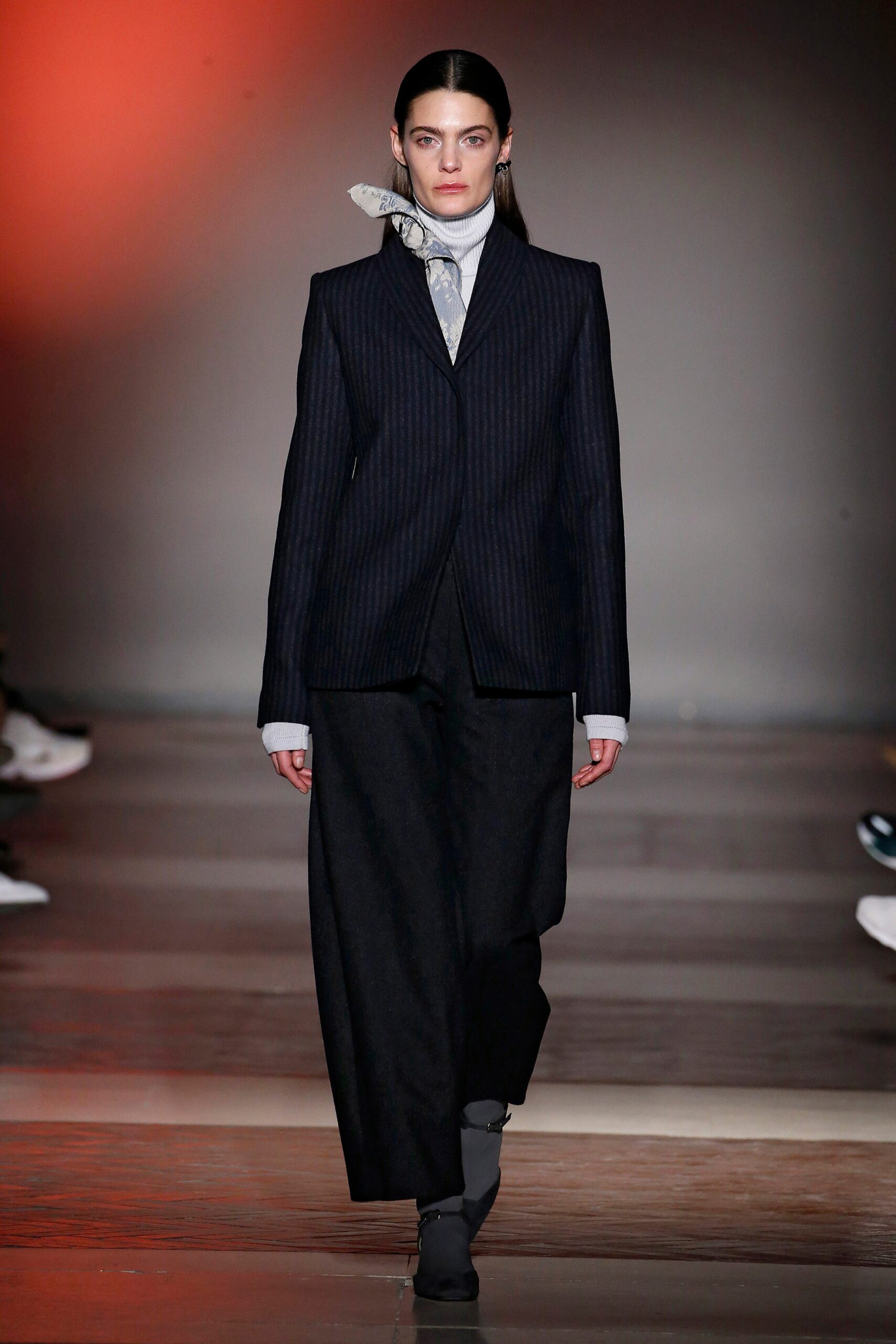 structured black blazer with wide-leg pants