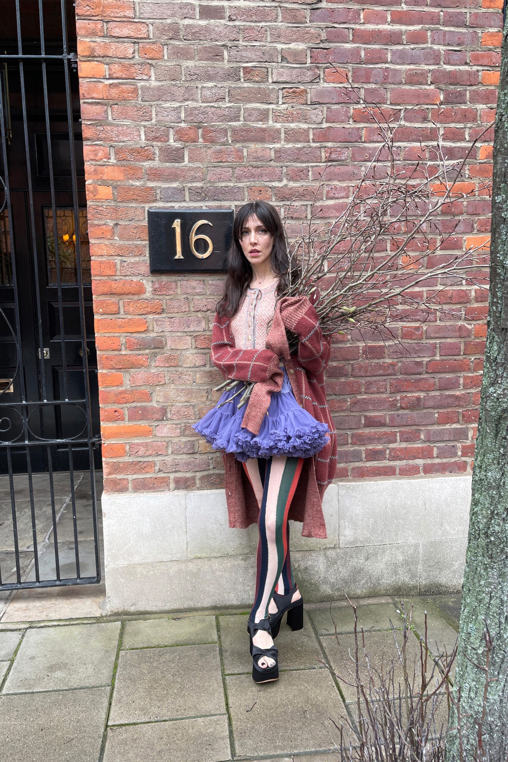 red wool coat with purple tulle skirt