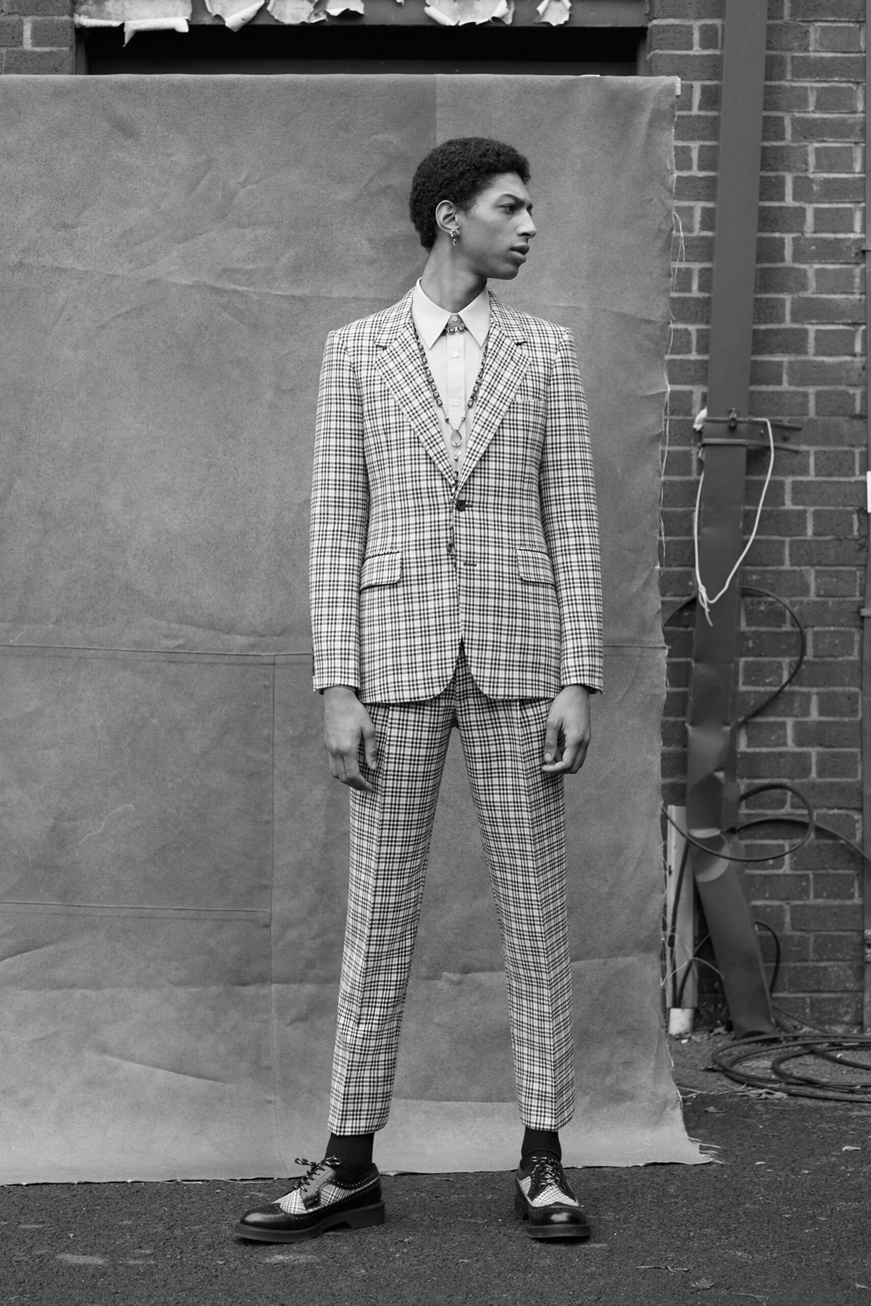 tailored black and white checked suit
