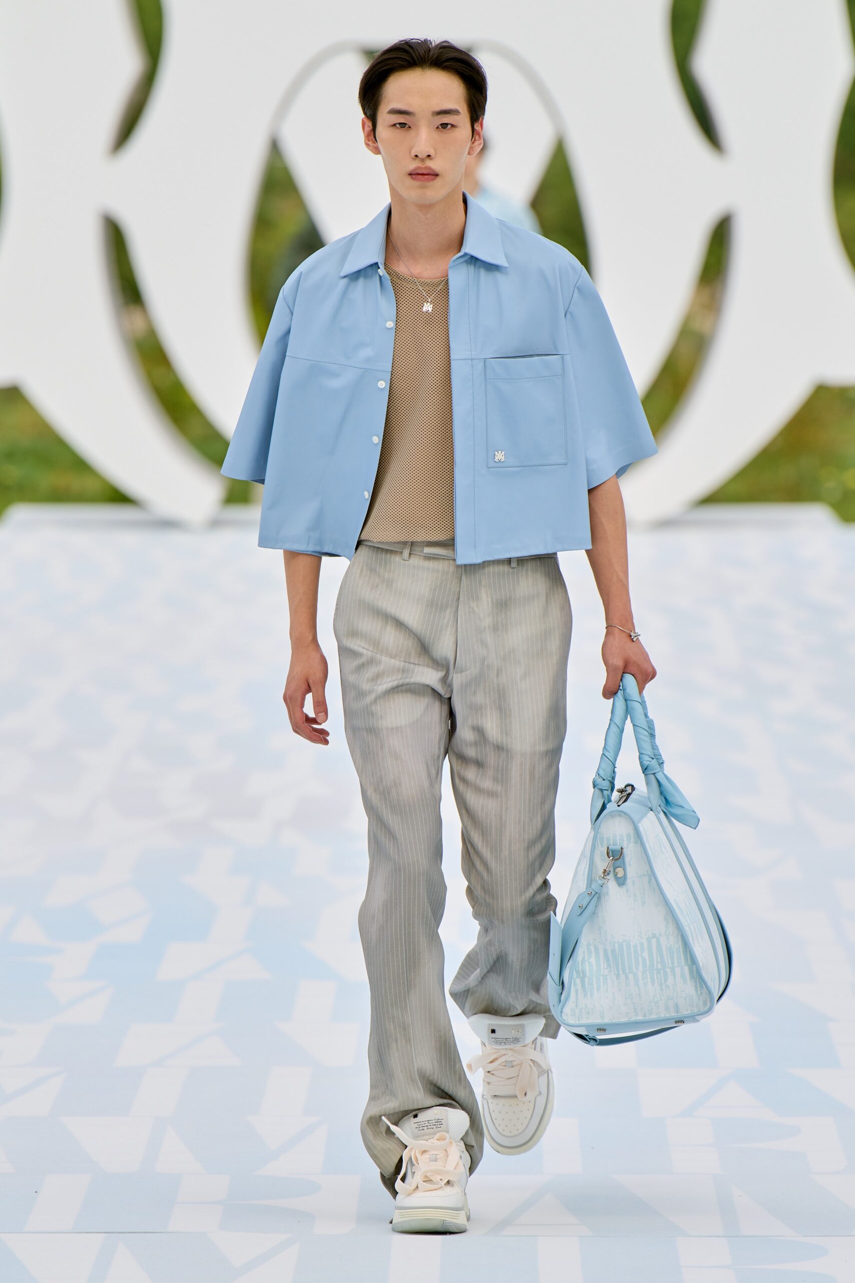 blue relaxed shirt with gray pants
