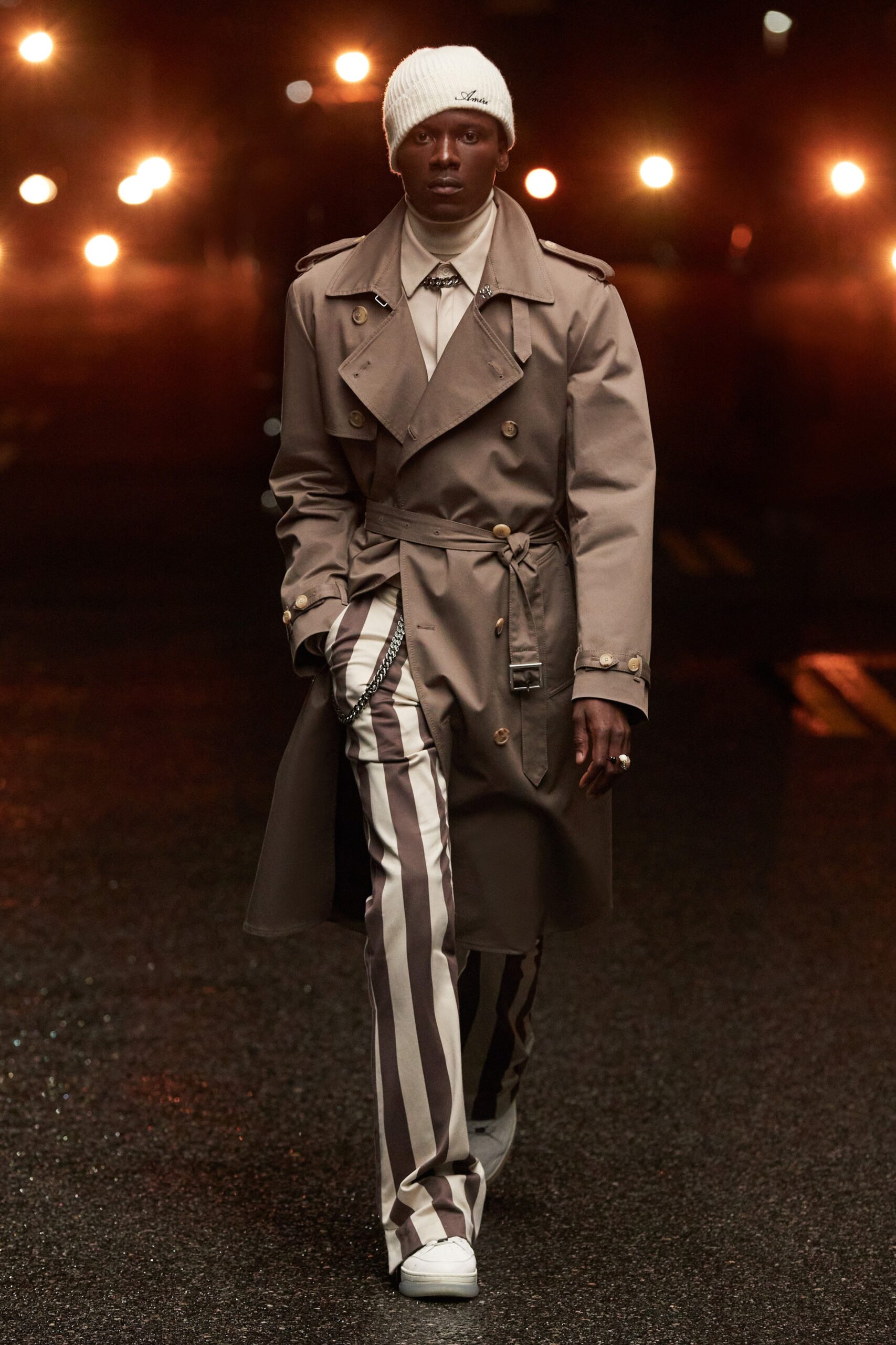 beige trench coat with striped pants