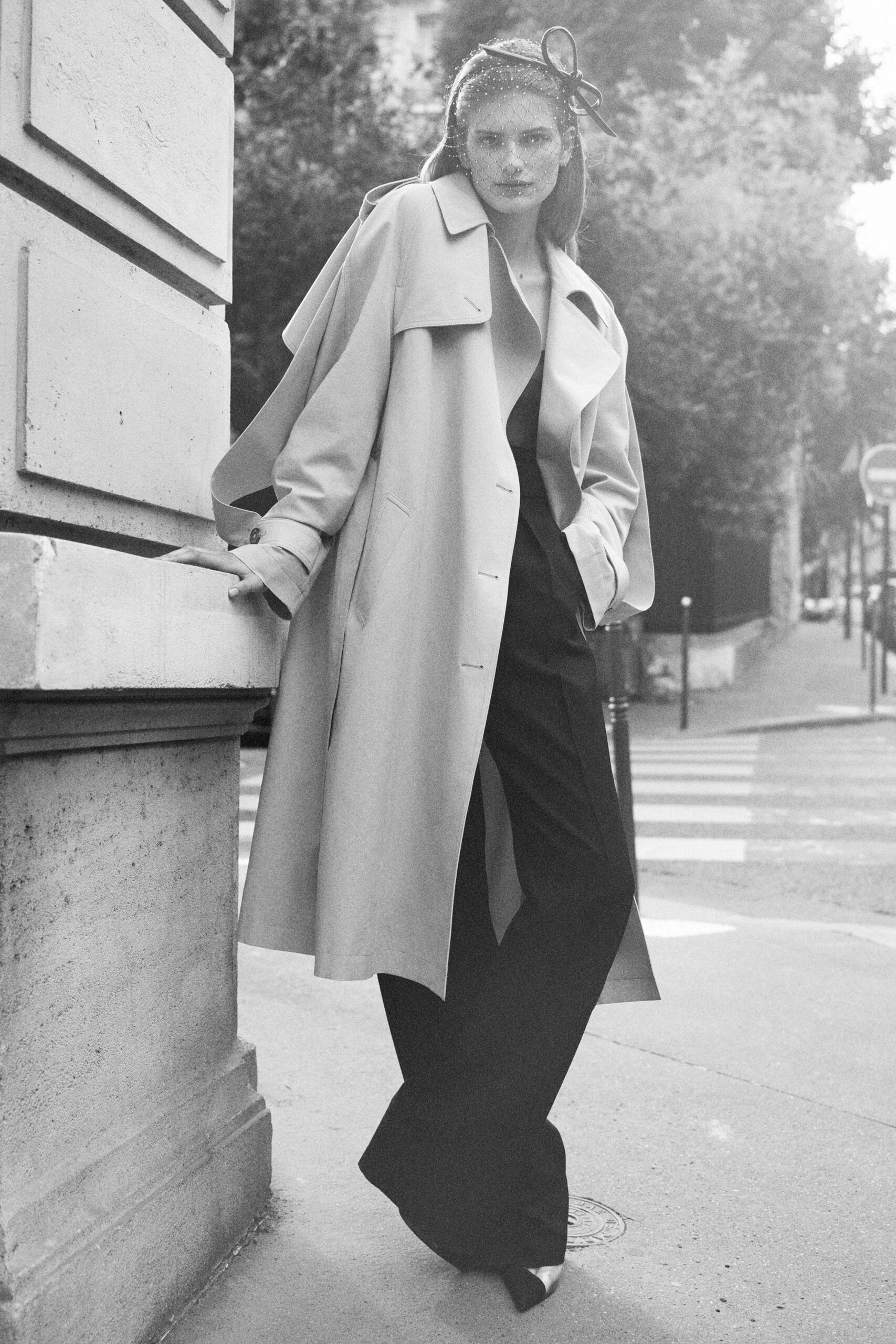 beige coat and black tailored pants