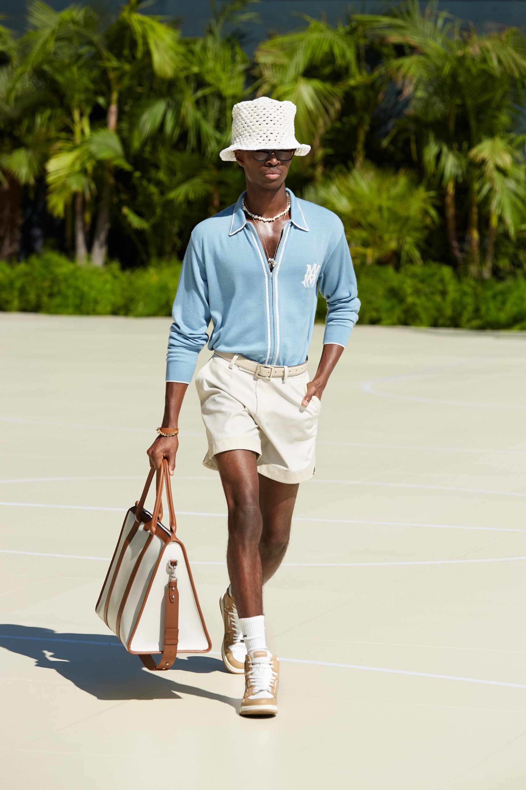 blue cotton shirt with beige shorts
