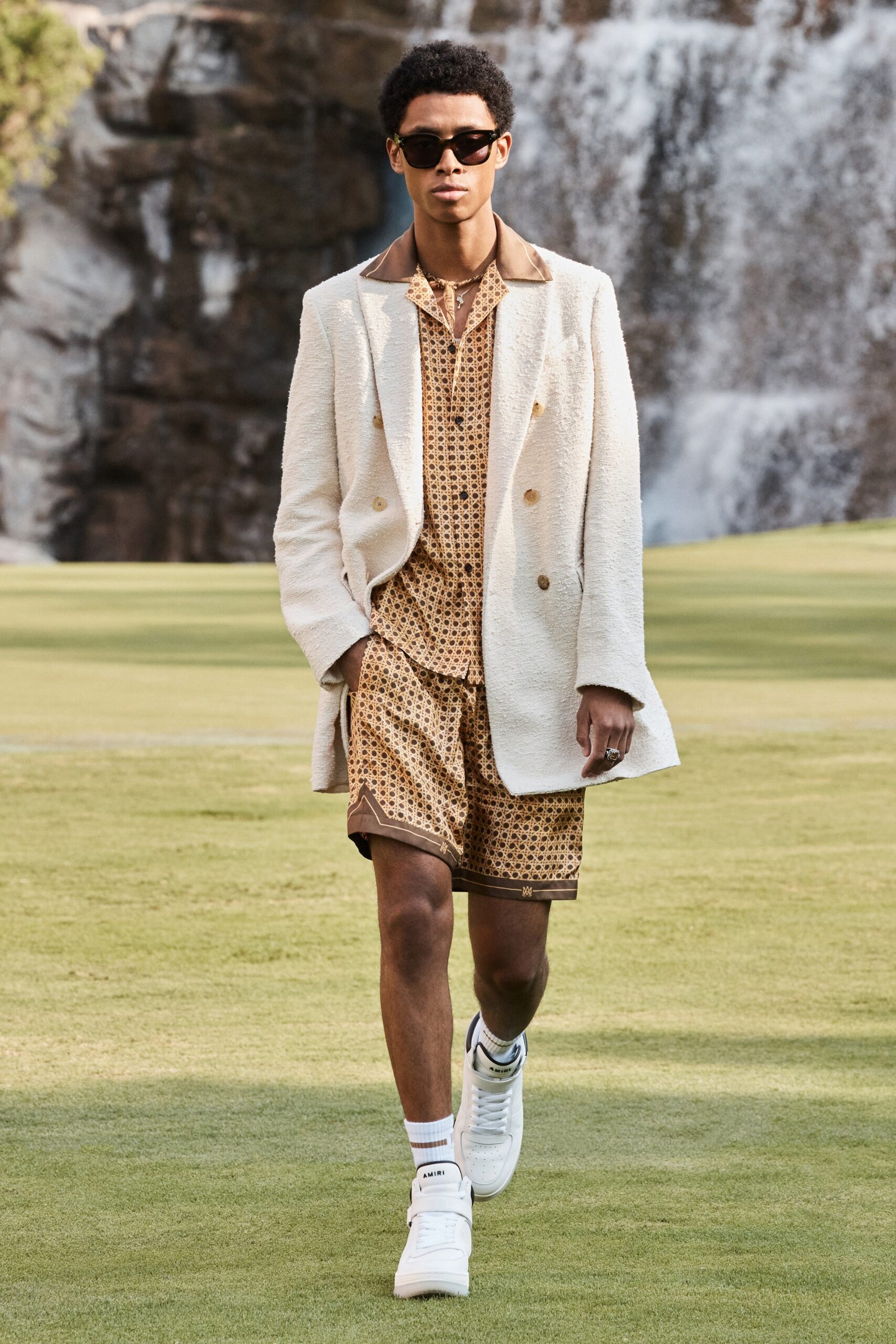 white tailored blazer with brown printed shorts