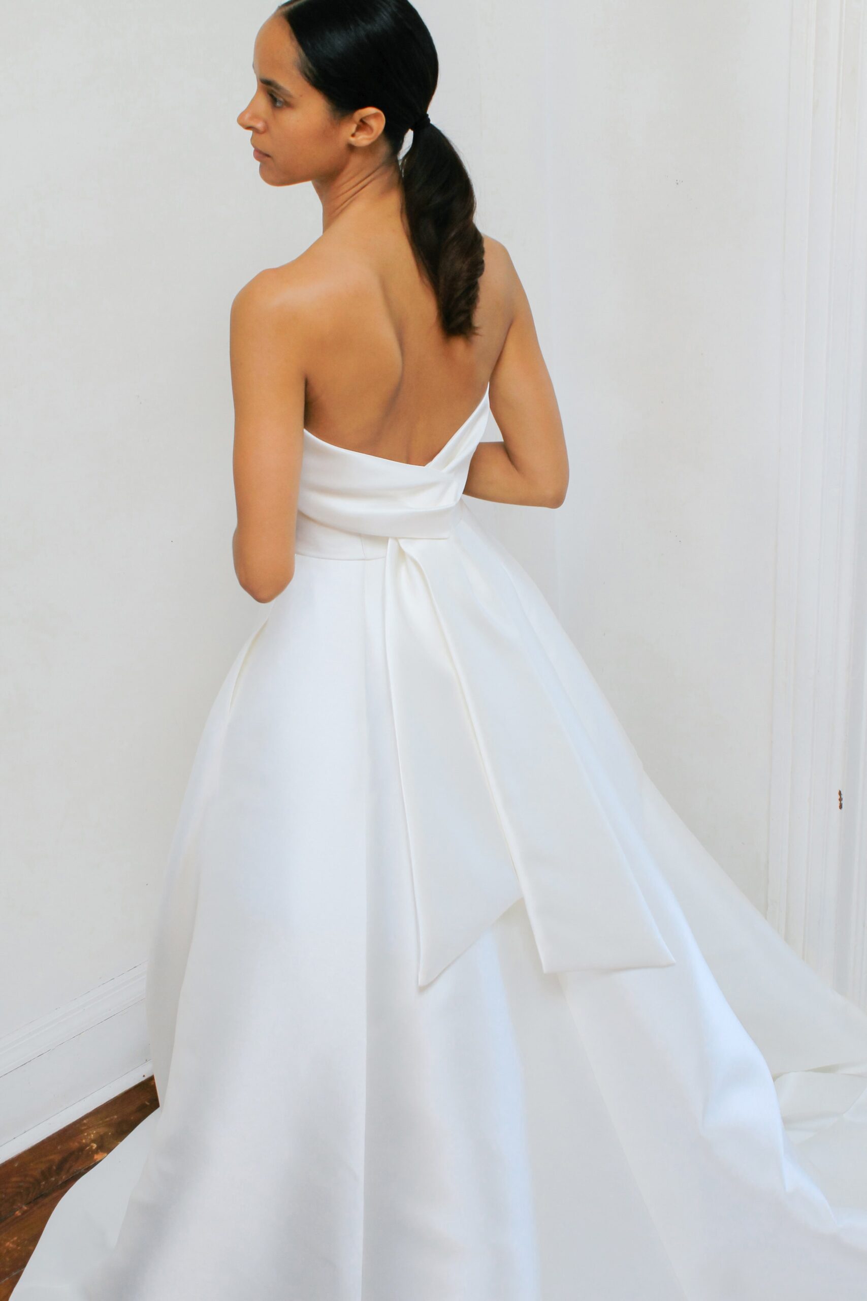 white silk strapless gown