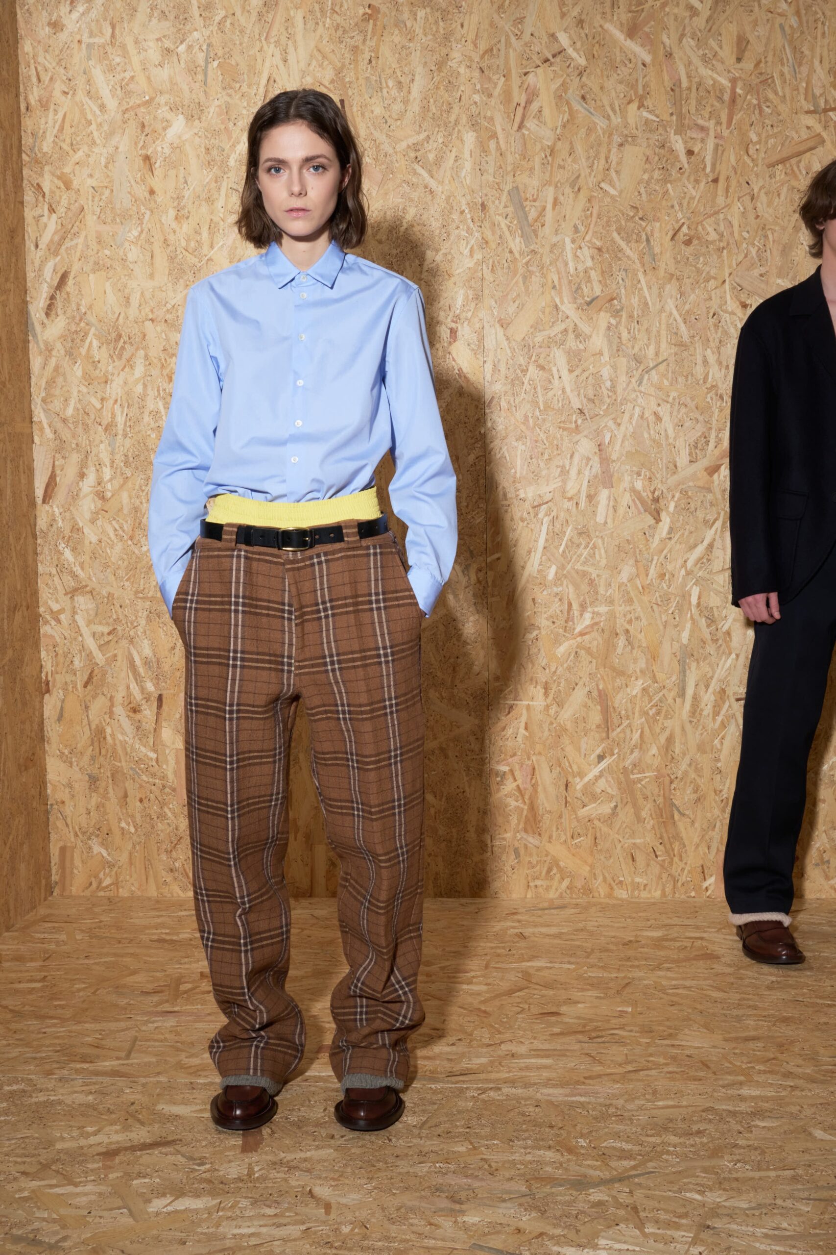 blue relaxed shirt with brown checked pants