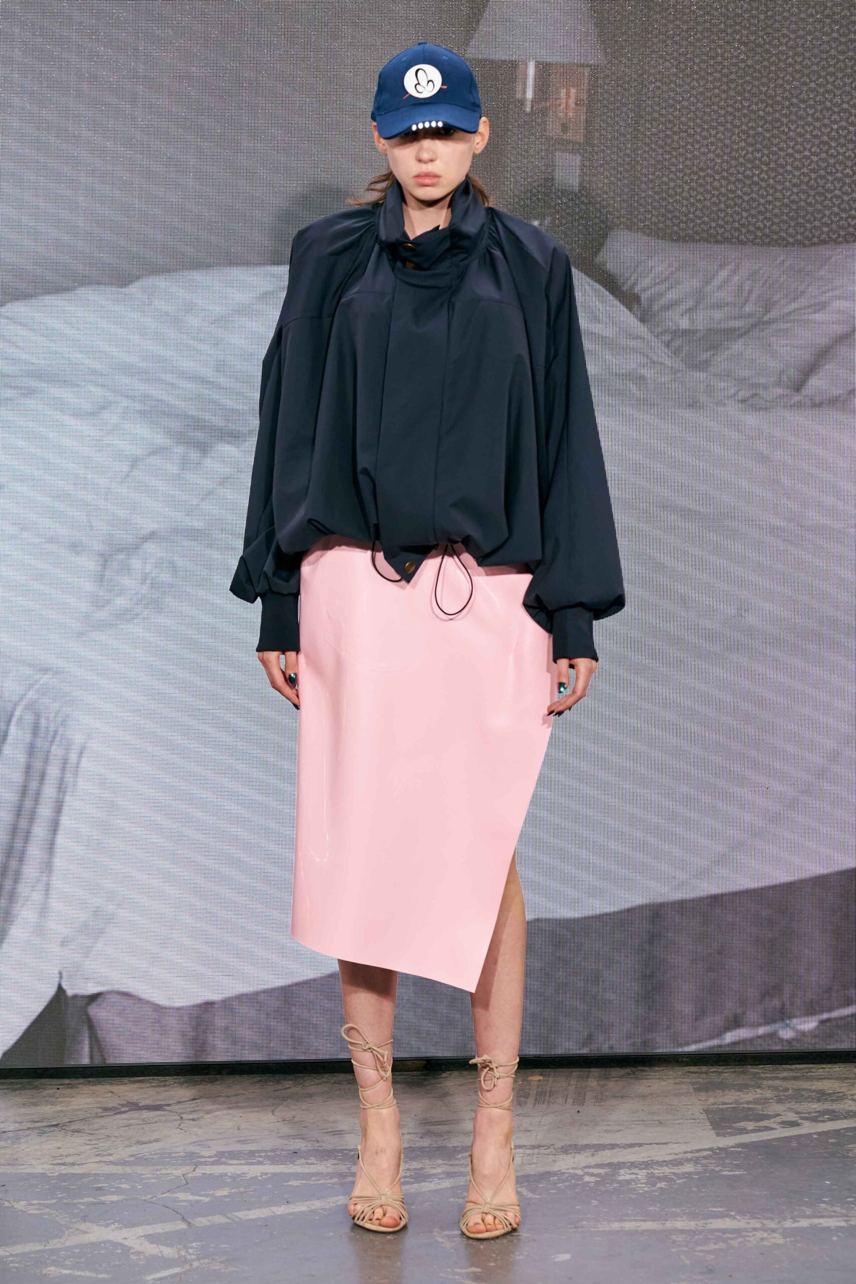 black cotton long-sleeve collared oversized draped top