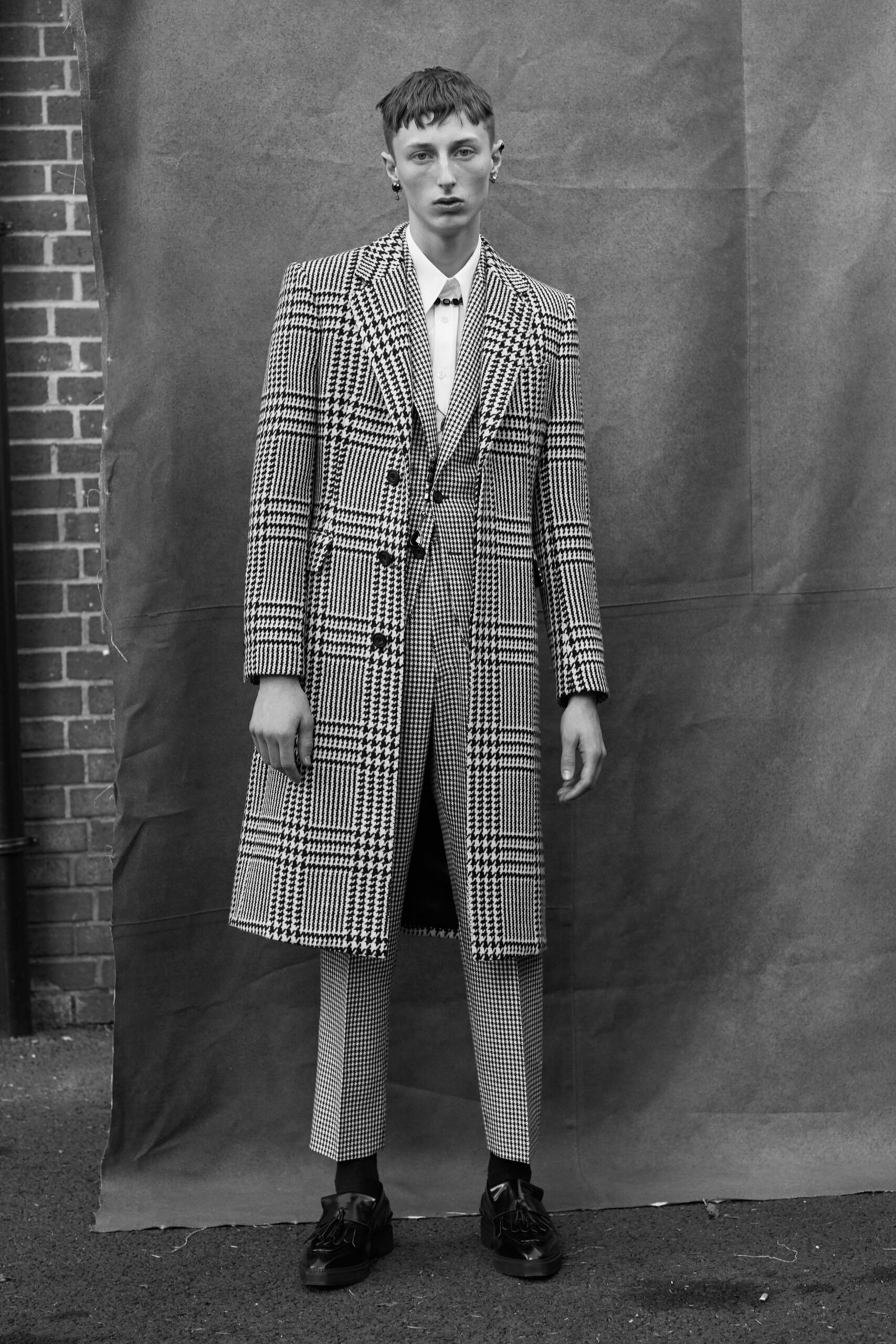 black and white tailored coat and pants