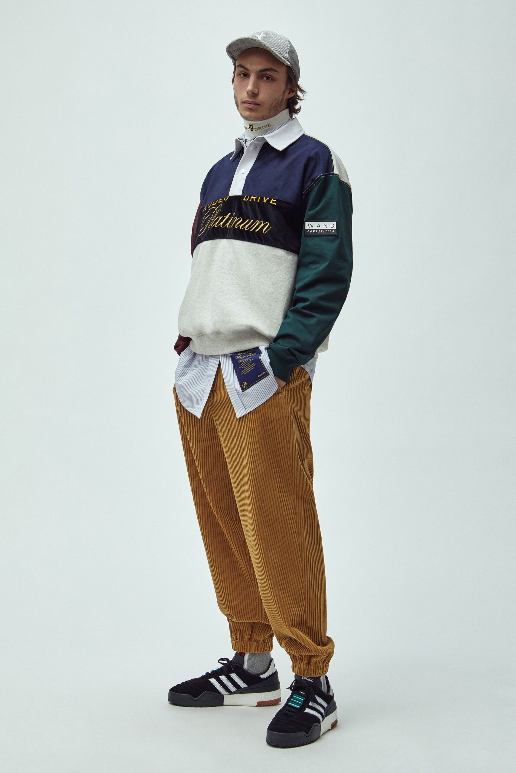 relaxed color-blocked sweater with corduroy pants