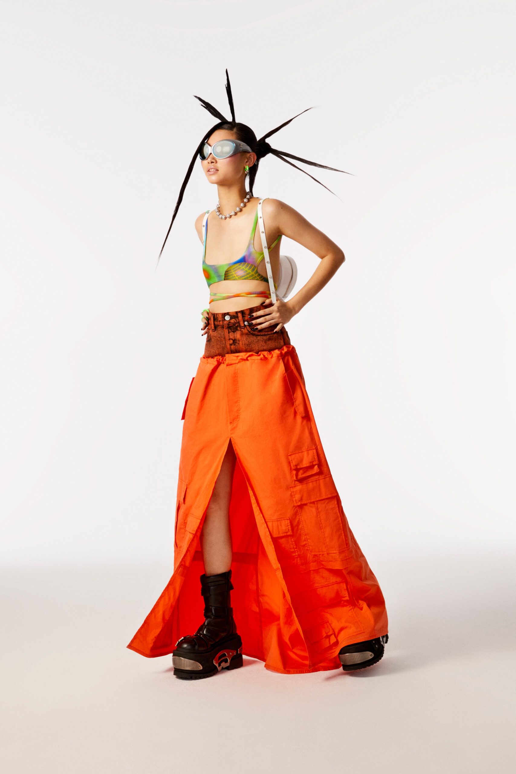 multi-colored fitted top and orange cargo skirt