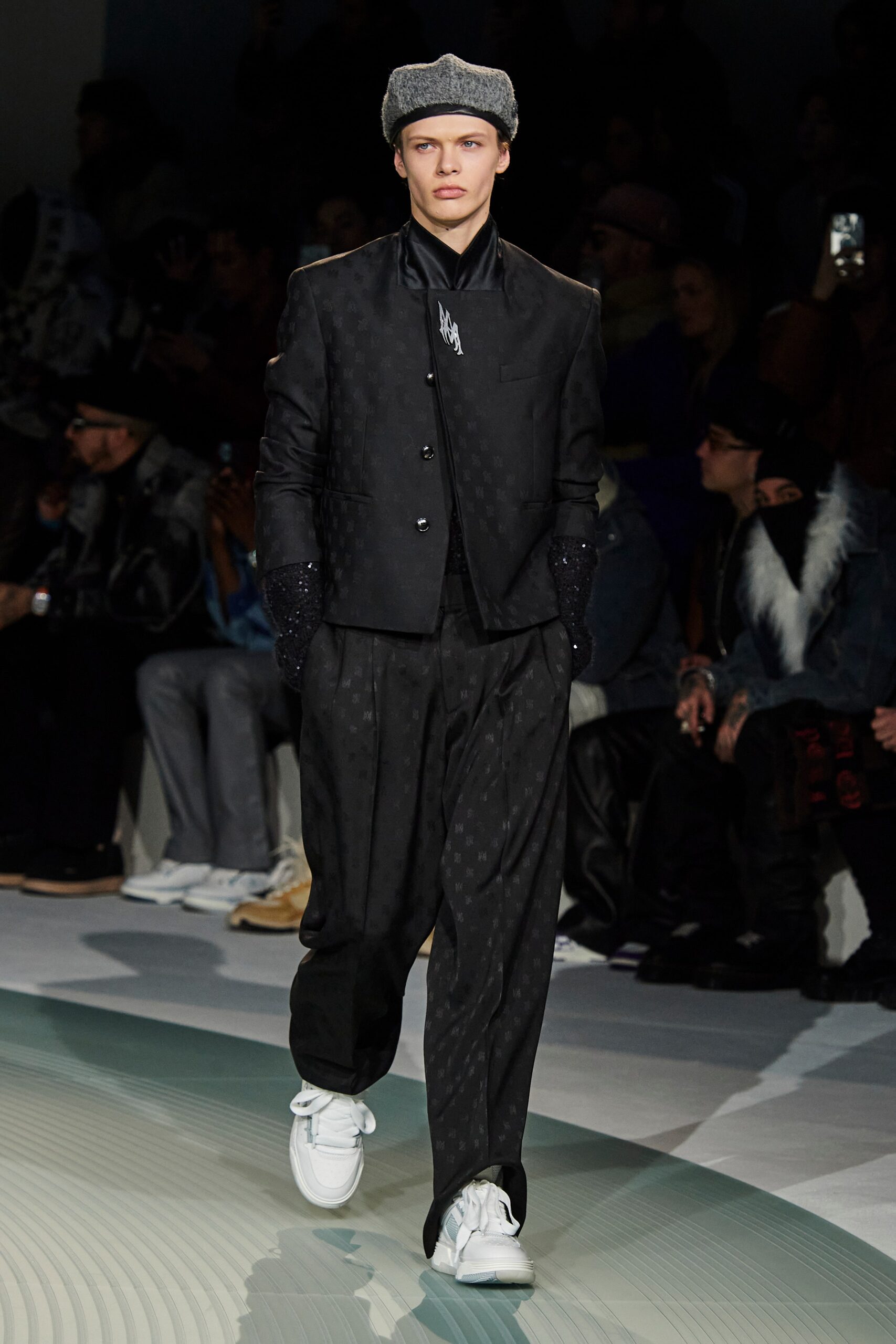 black tailored blazer with relaxed pants