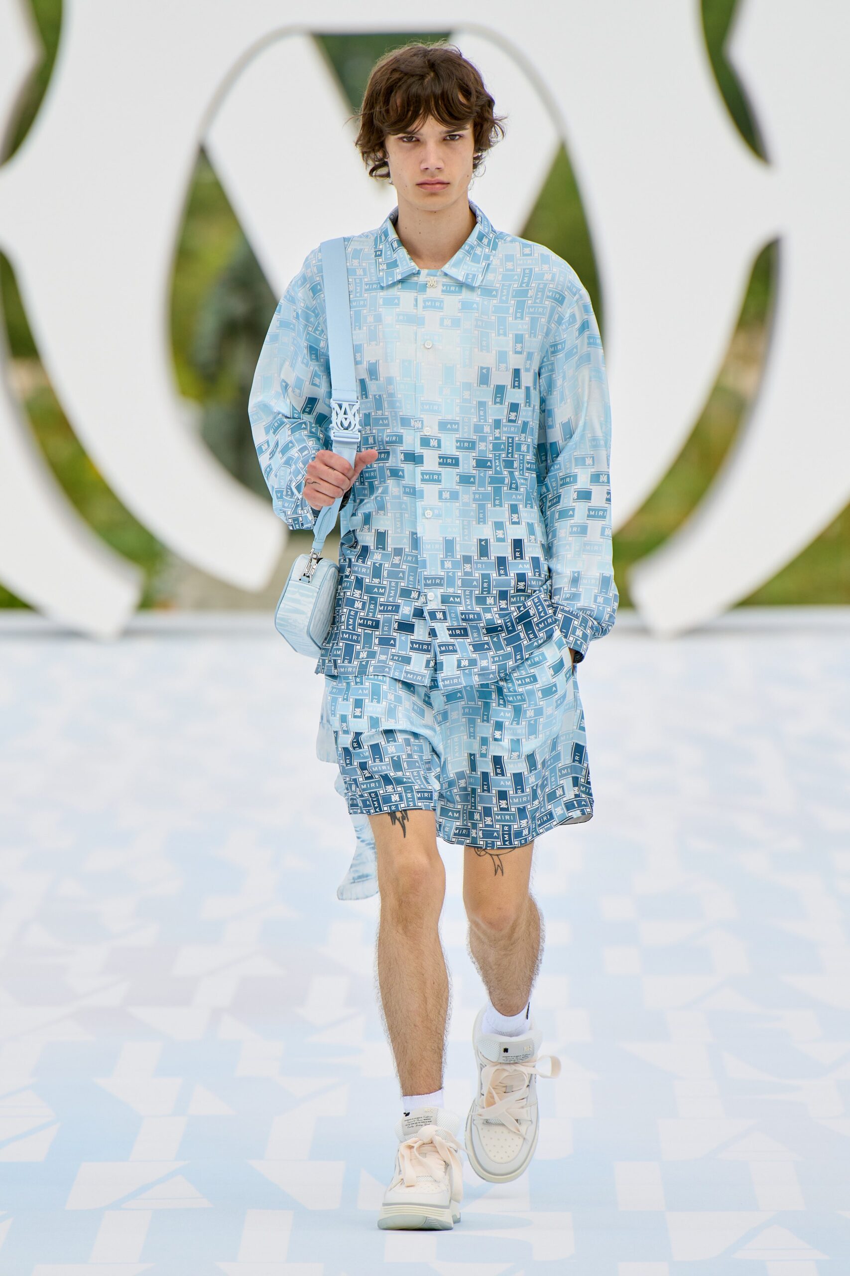blue printed shirt and shorts