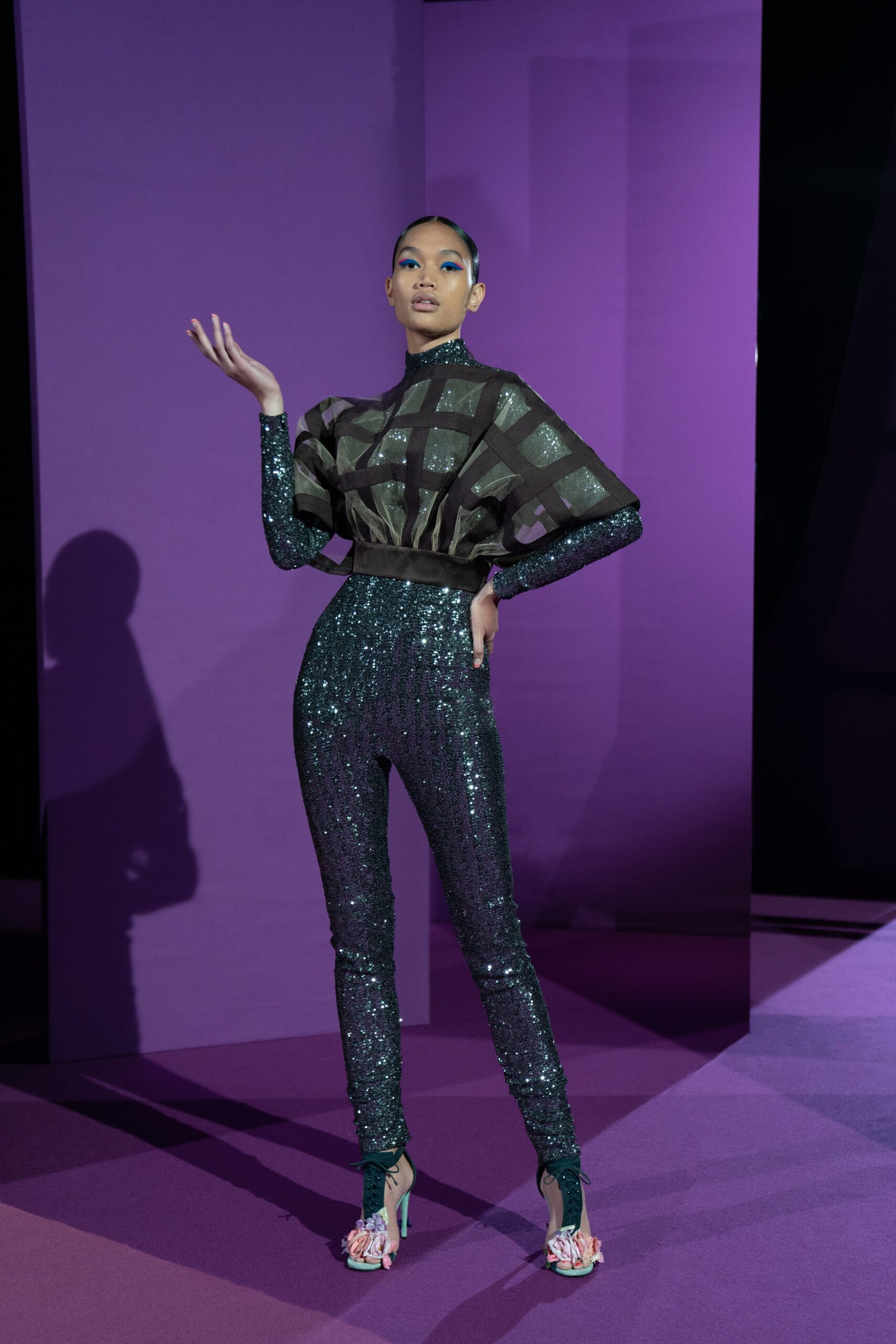 black sequined fitted top and pants