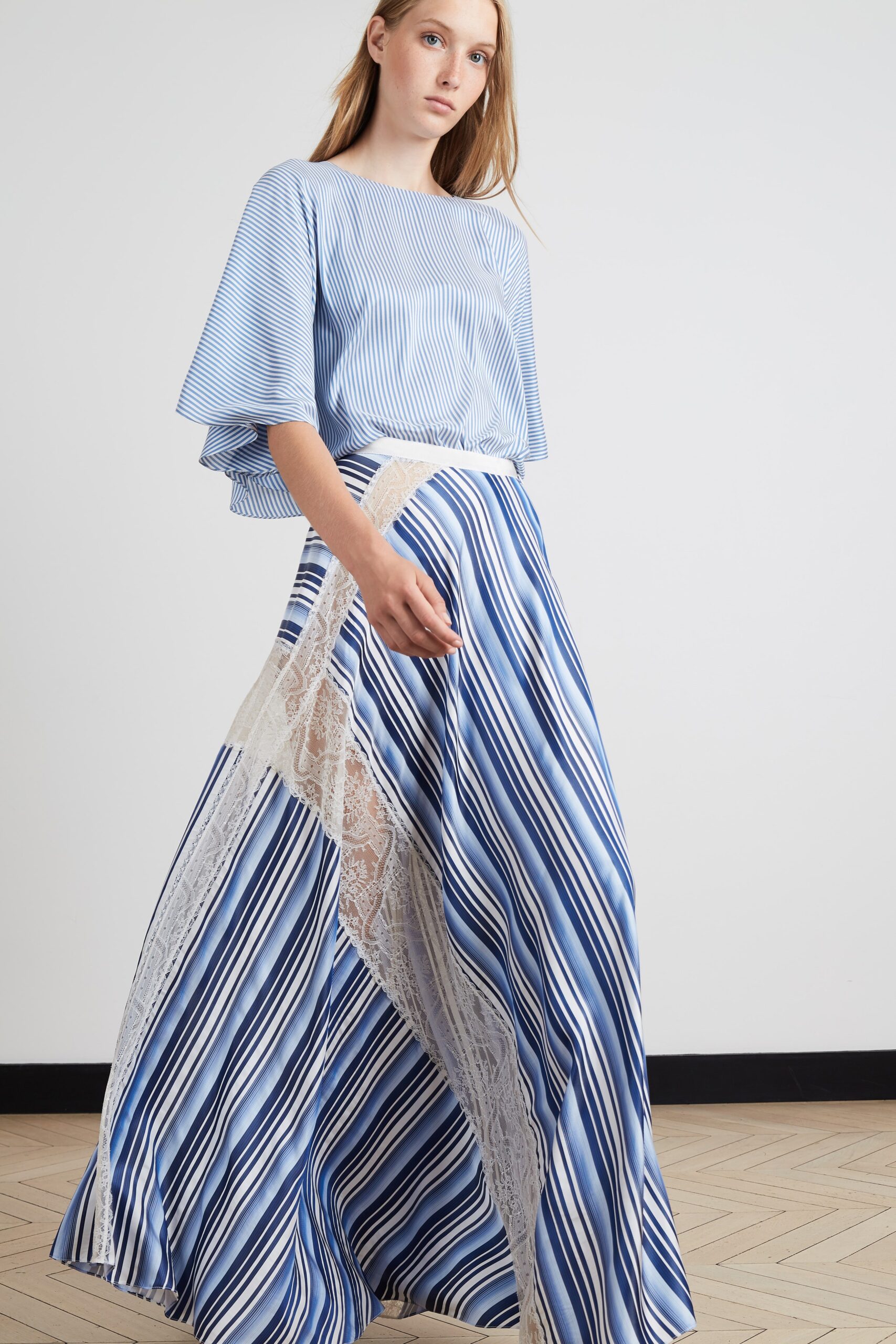 blue and white striped top with asymmetric skirt