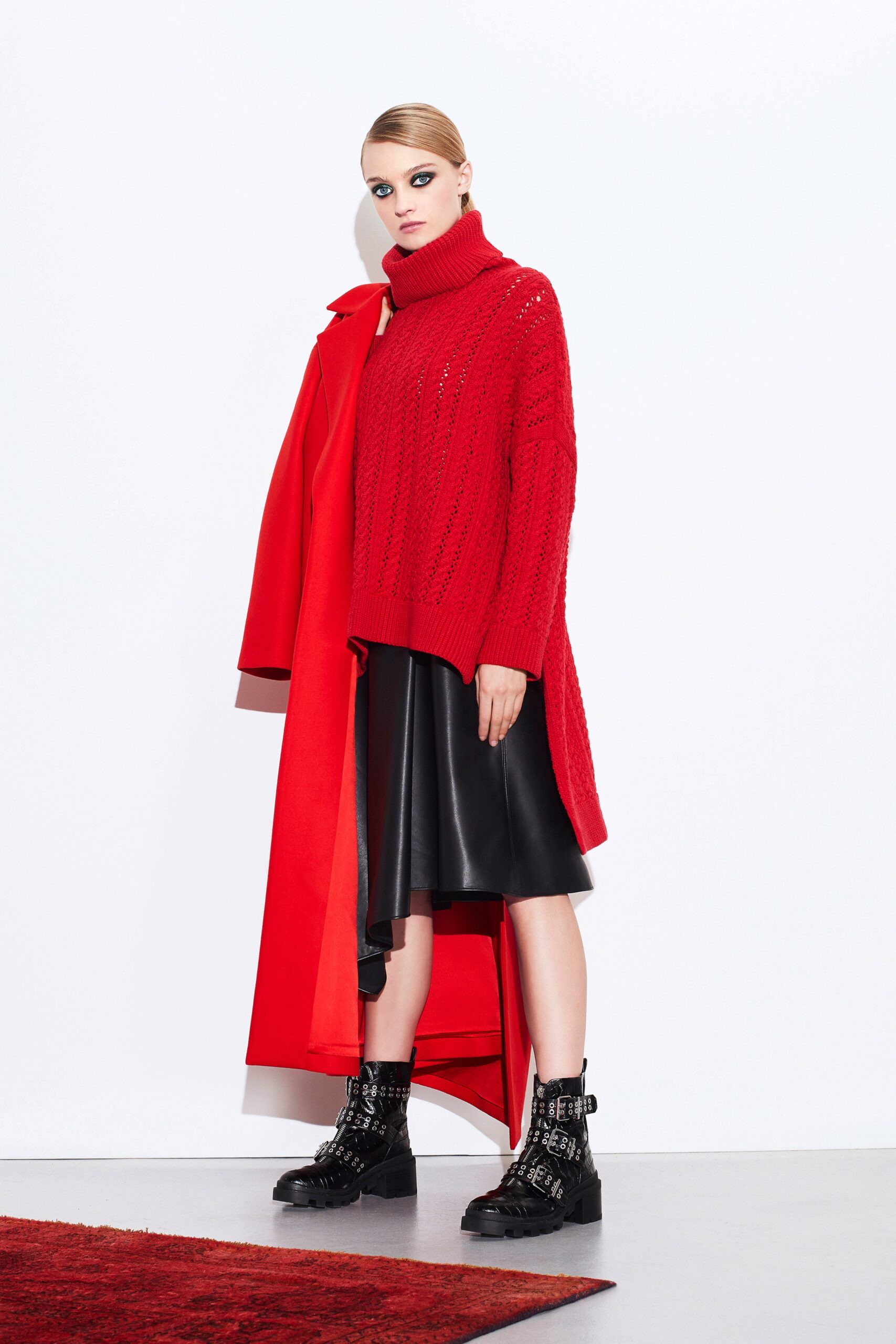 red oversized coat with black skirt