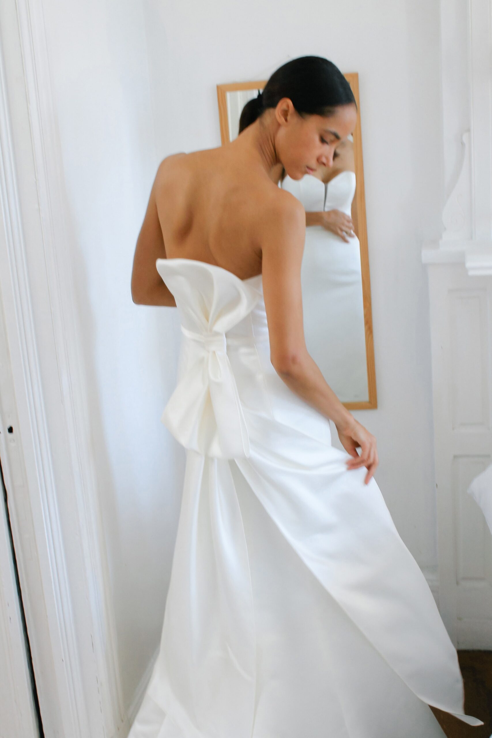 white silk strapless gown