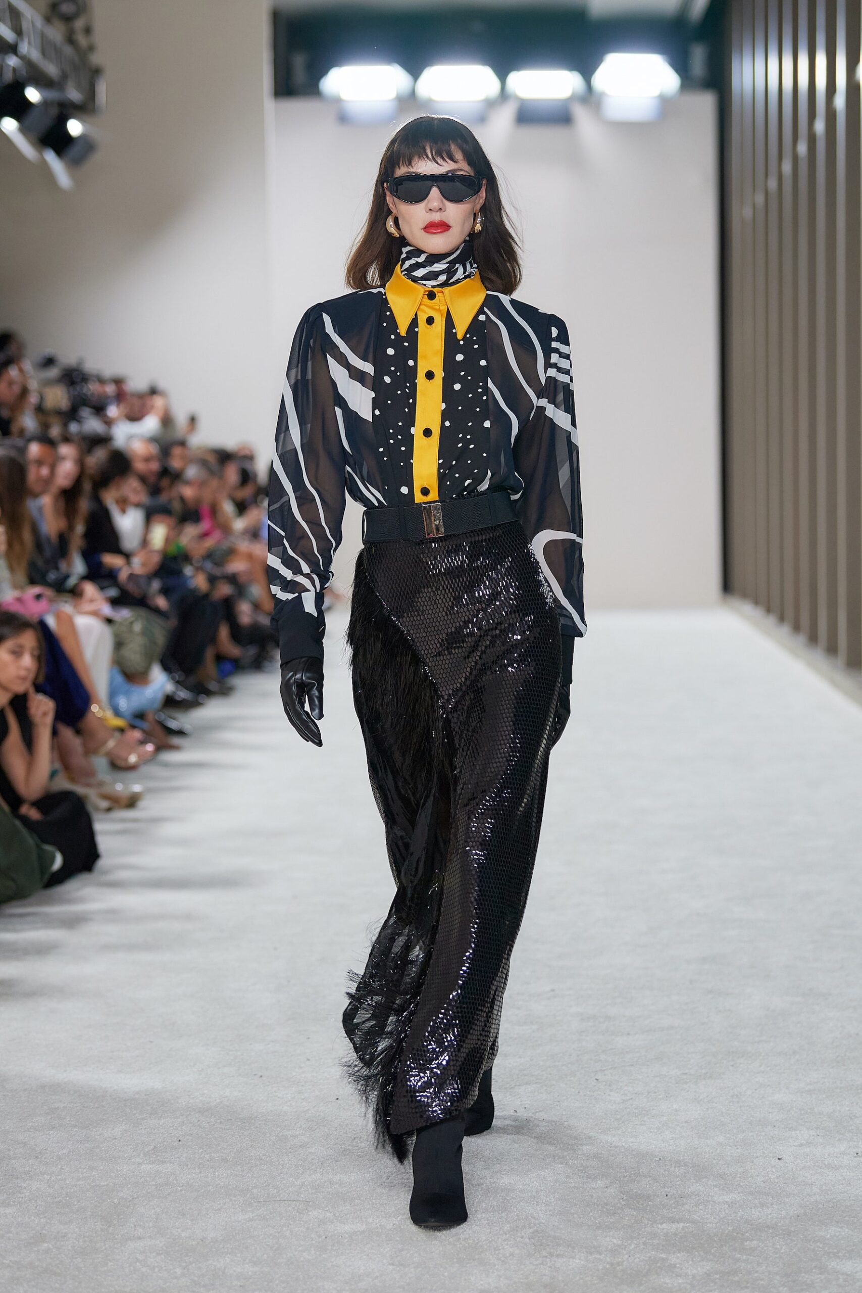 black sequined pants and blouse