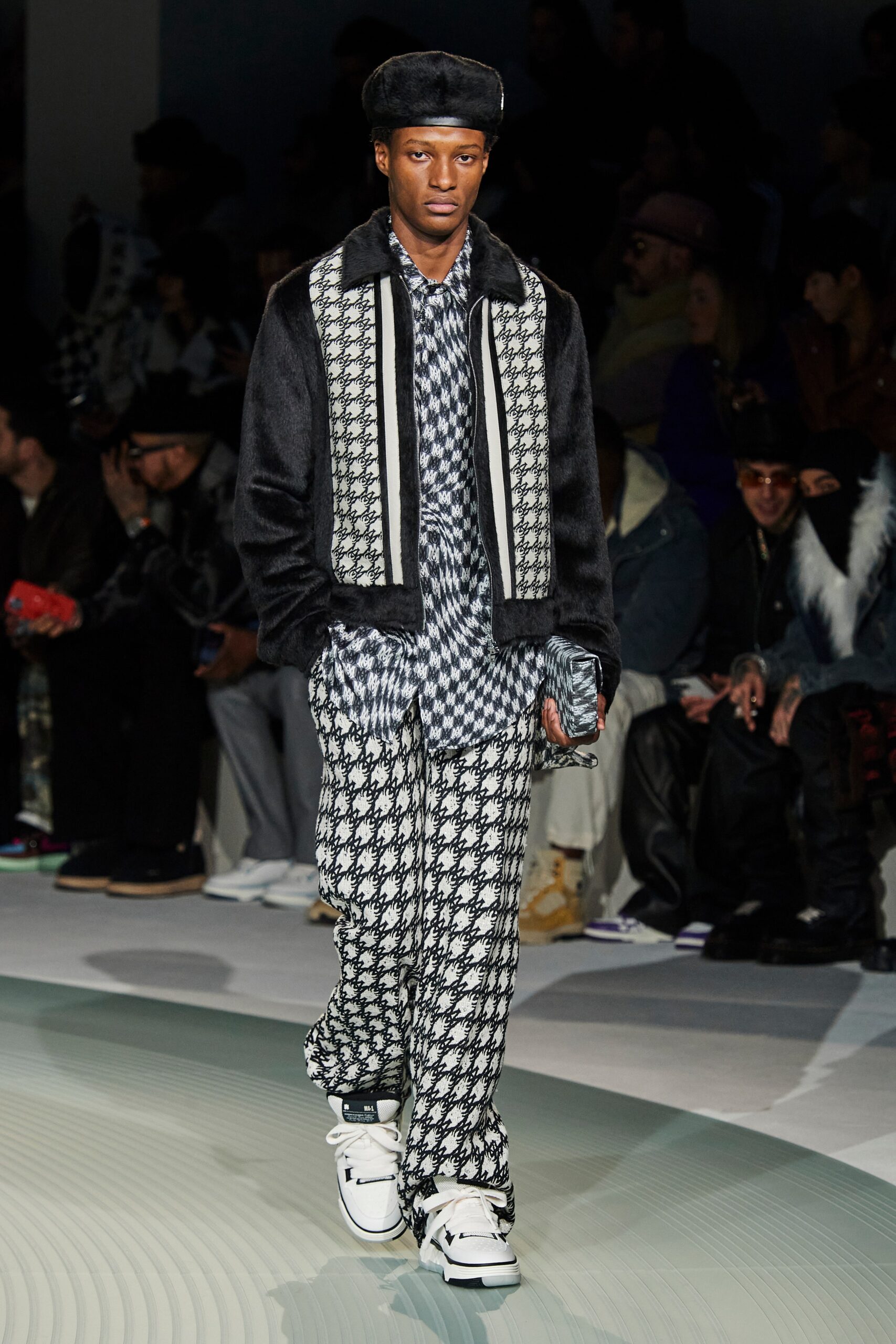black faux-fur jacket with printed shirt