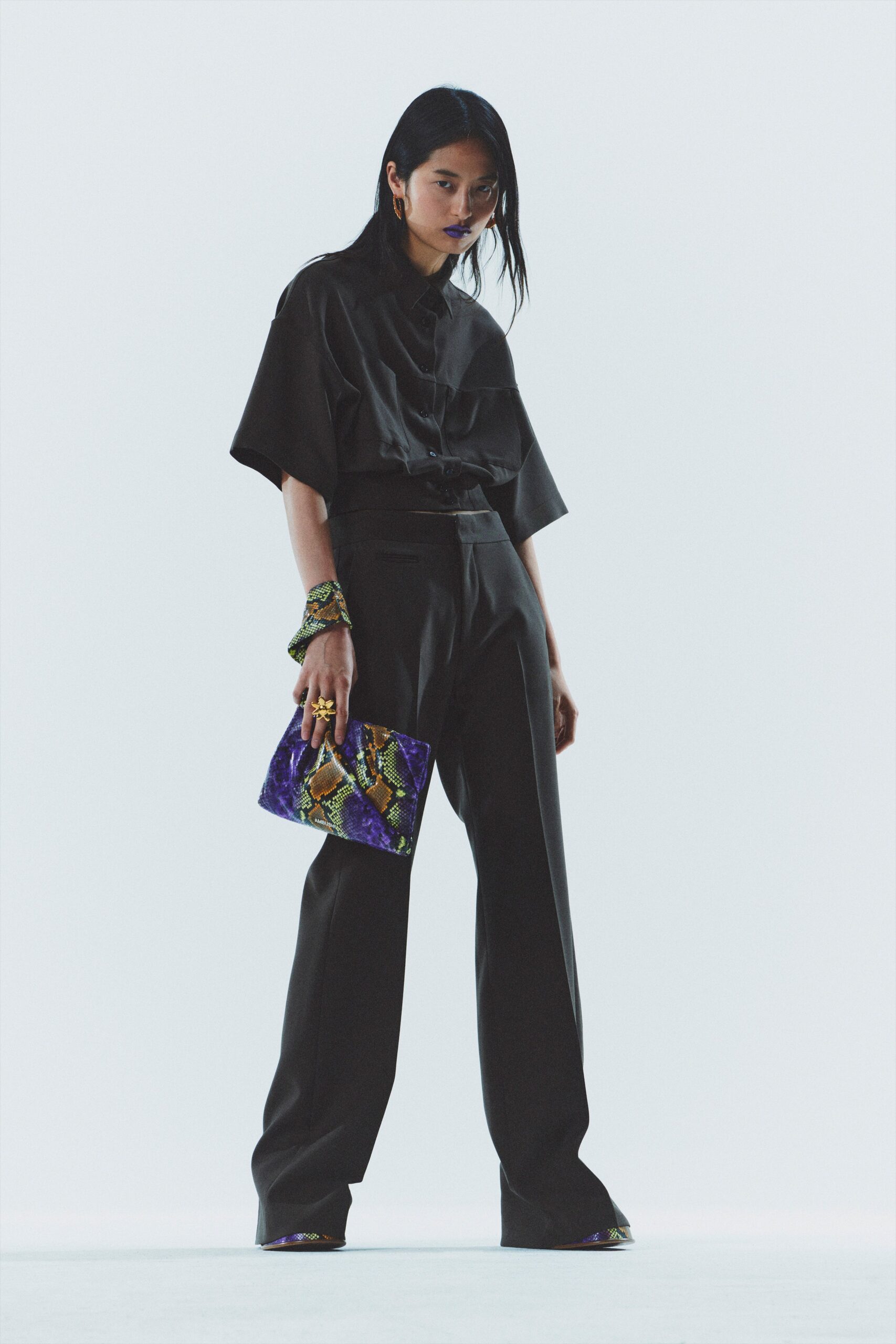 black relaxed shirt and tailored pants