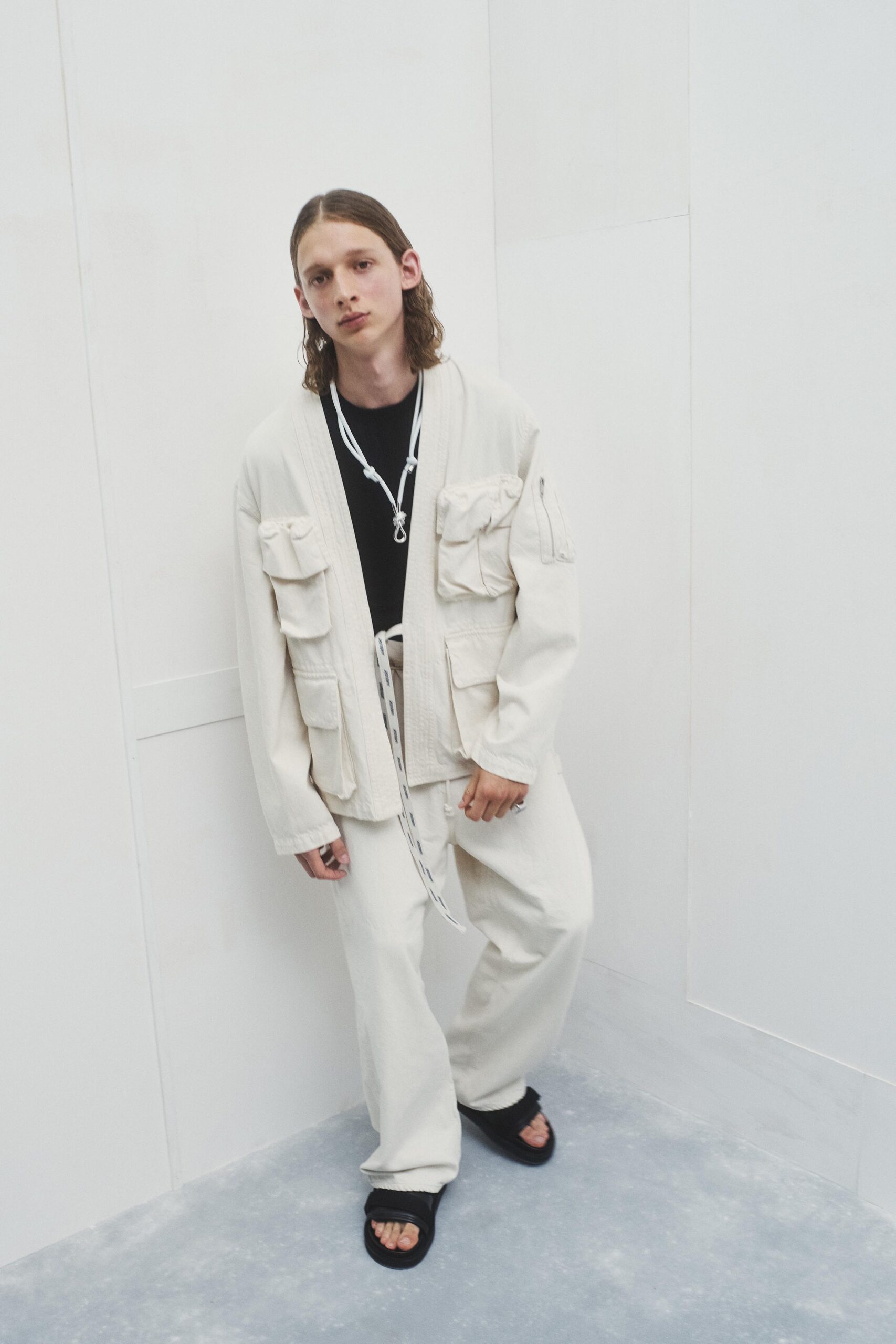 white relaxed jacket with black t-shirt