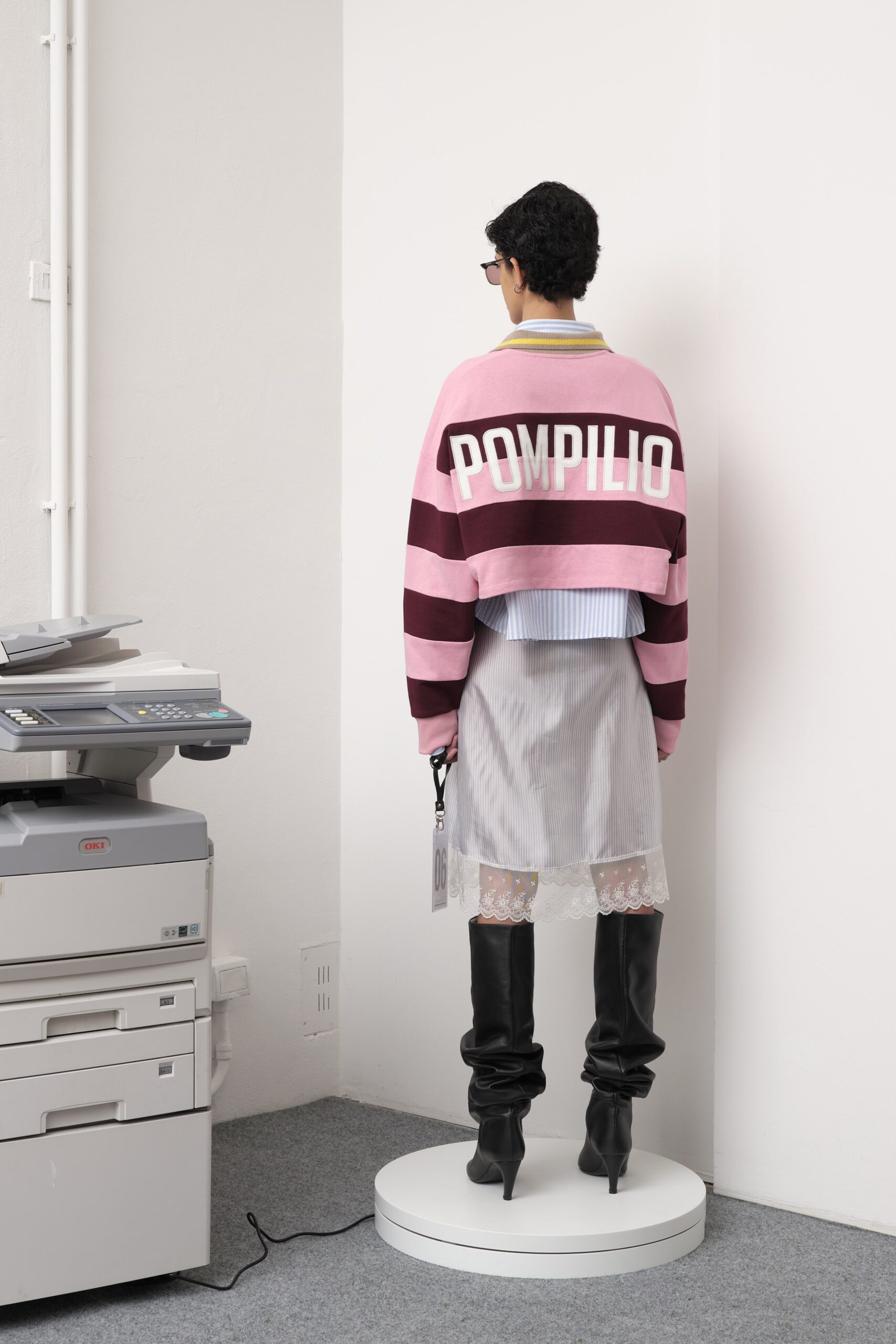pink striped cropped sweater with pleated skirt