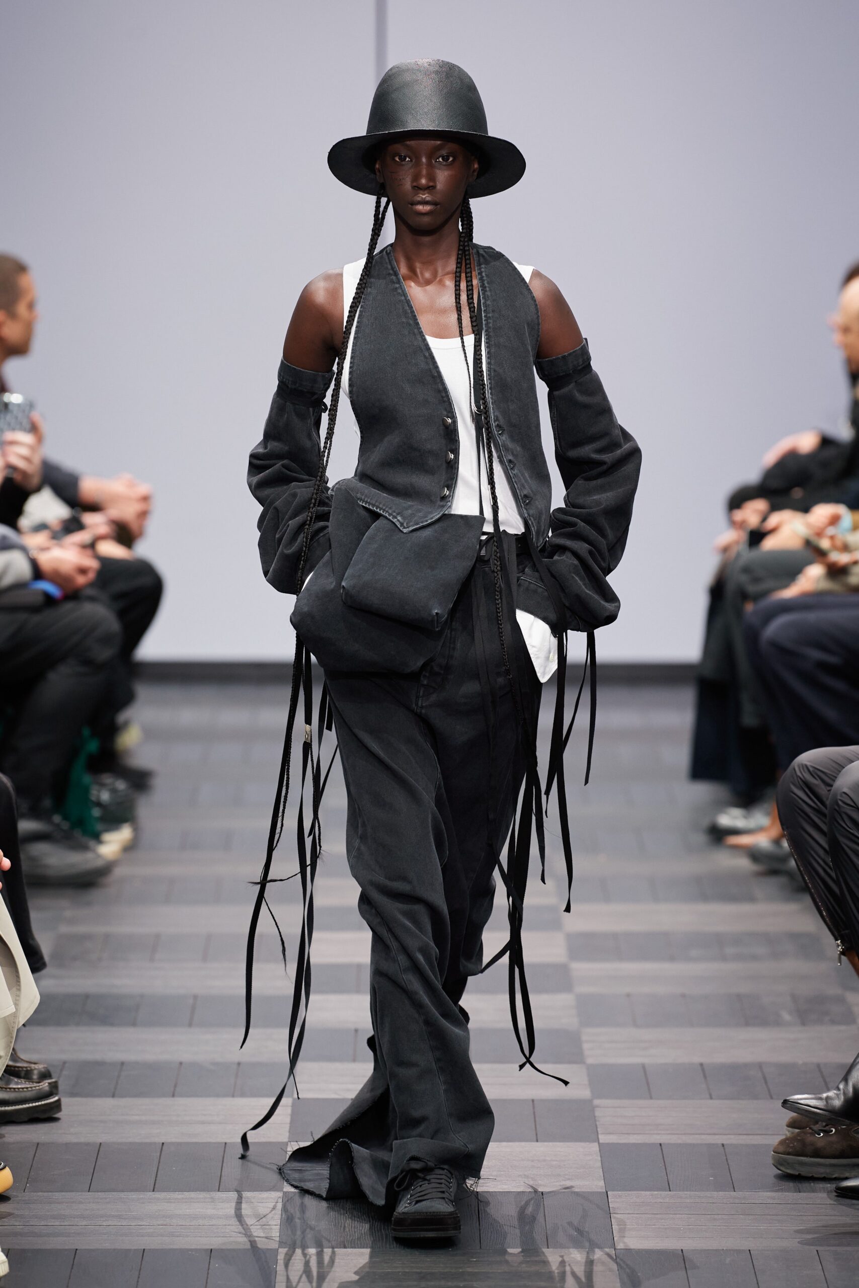 black relaxed vest with flared pants