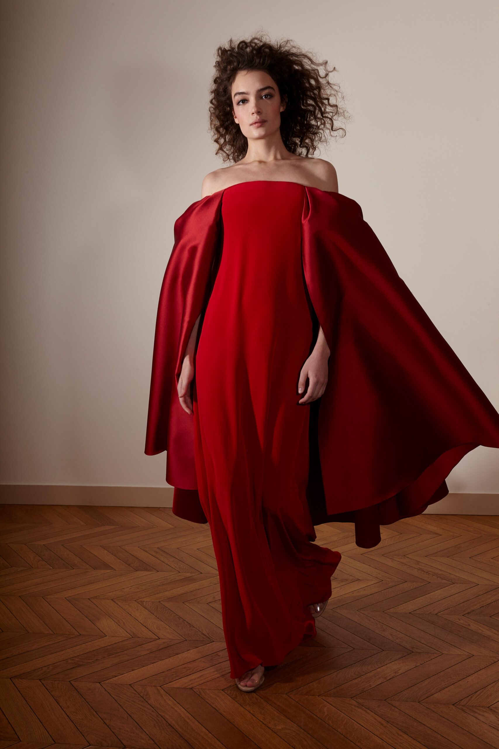 red silk gown with cape