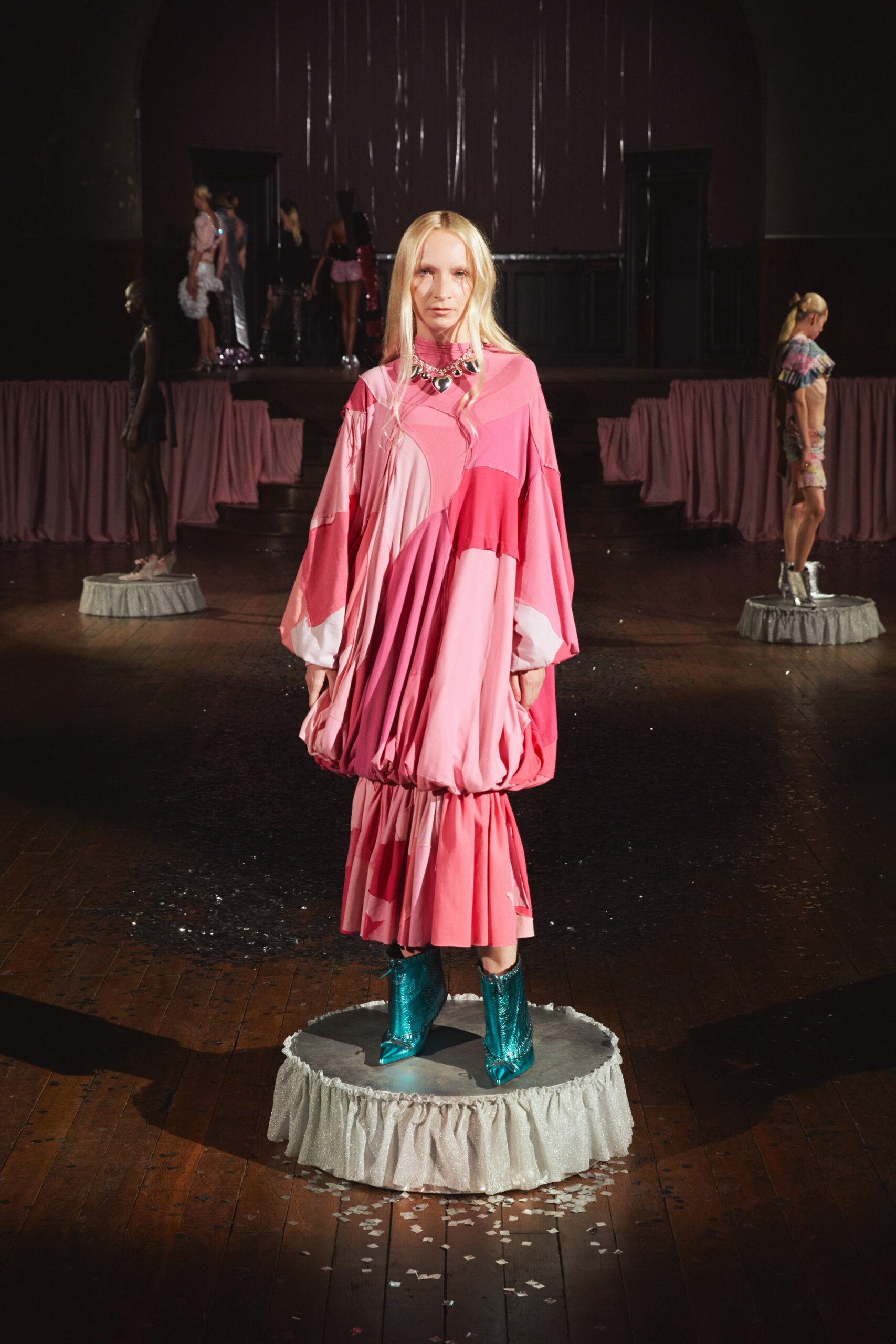 pink coral pleated midi dress with teal boots