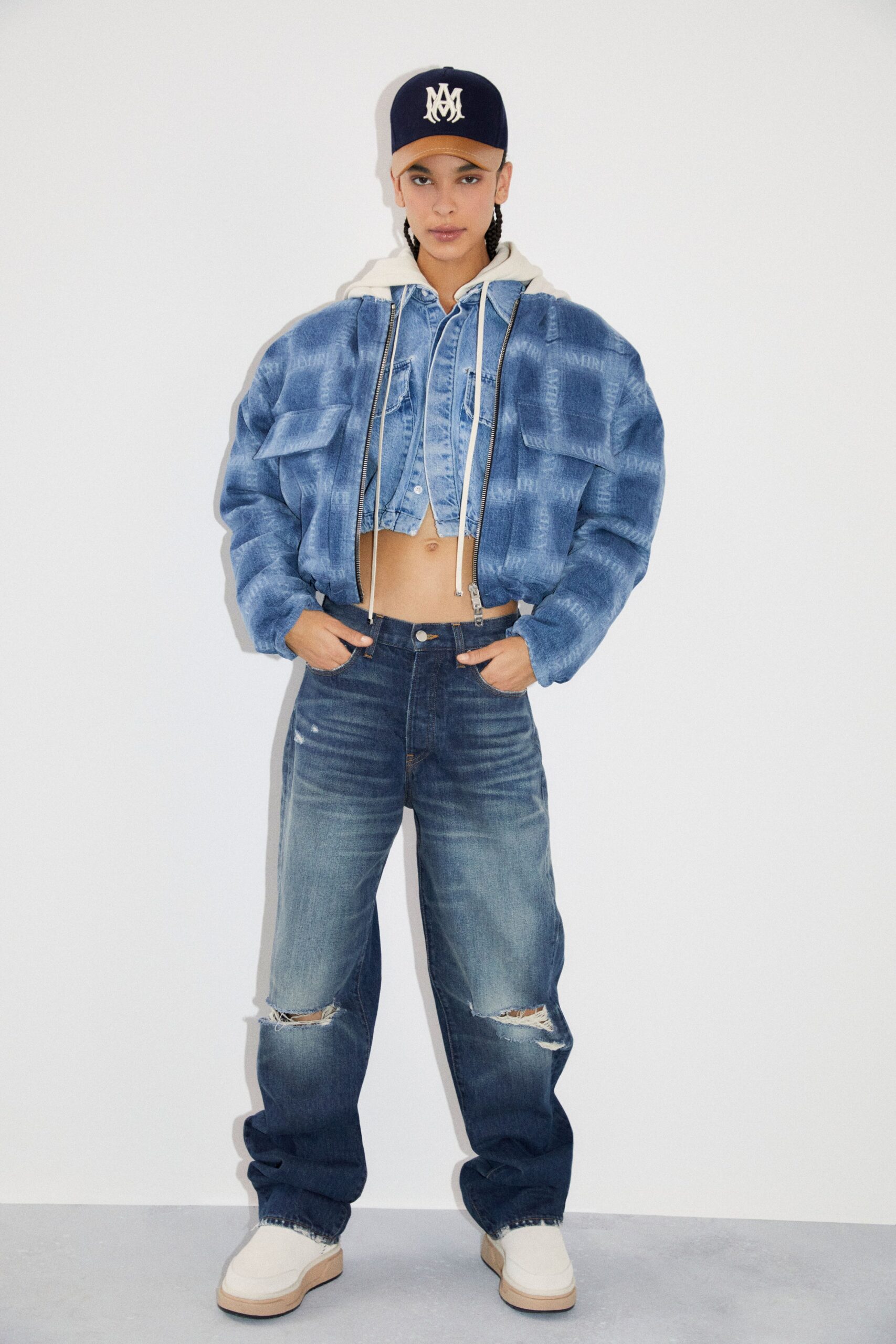 blue denim sleeveless collared fitted buttoned top