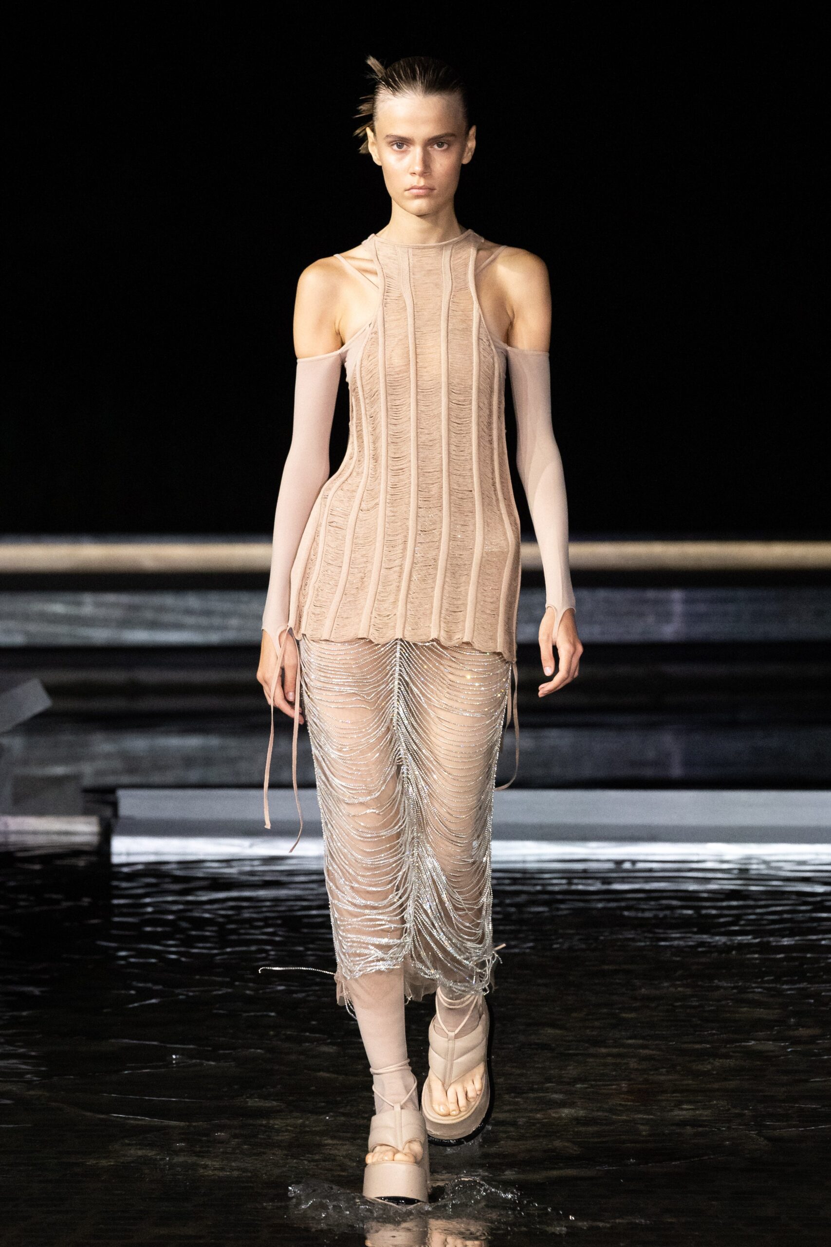 beige fitted knit top and pants