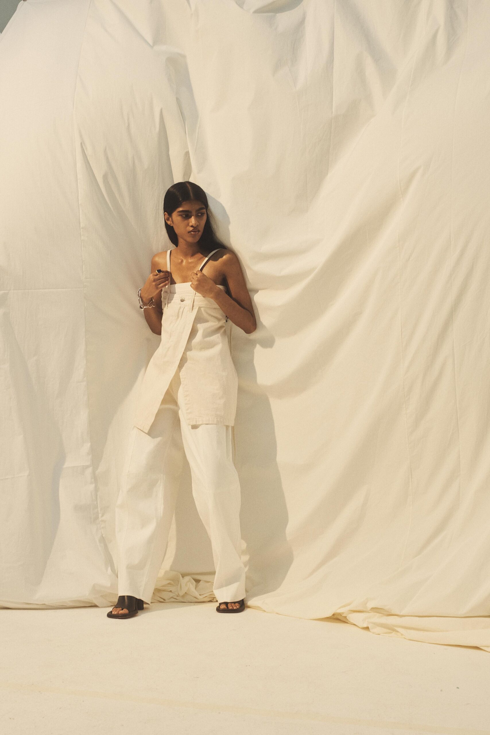 beige cotton jumpsuit with white pants