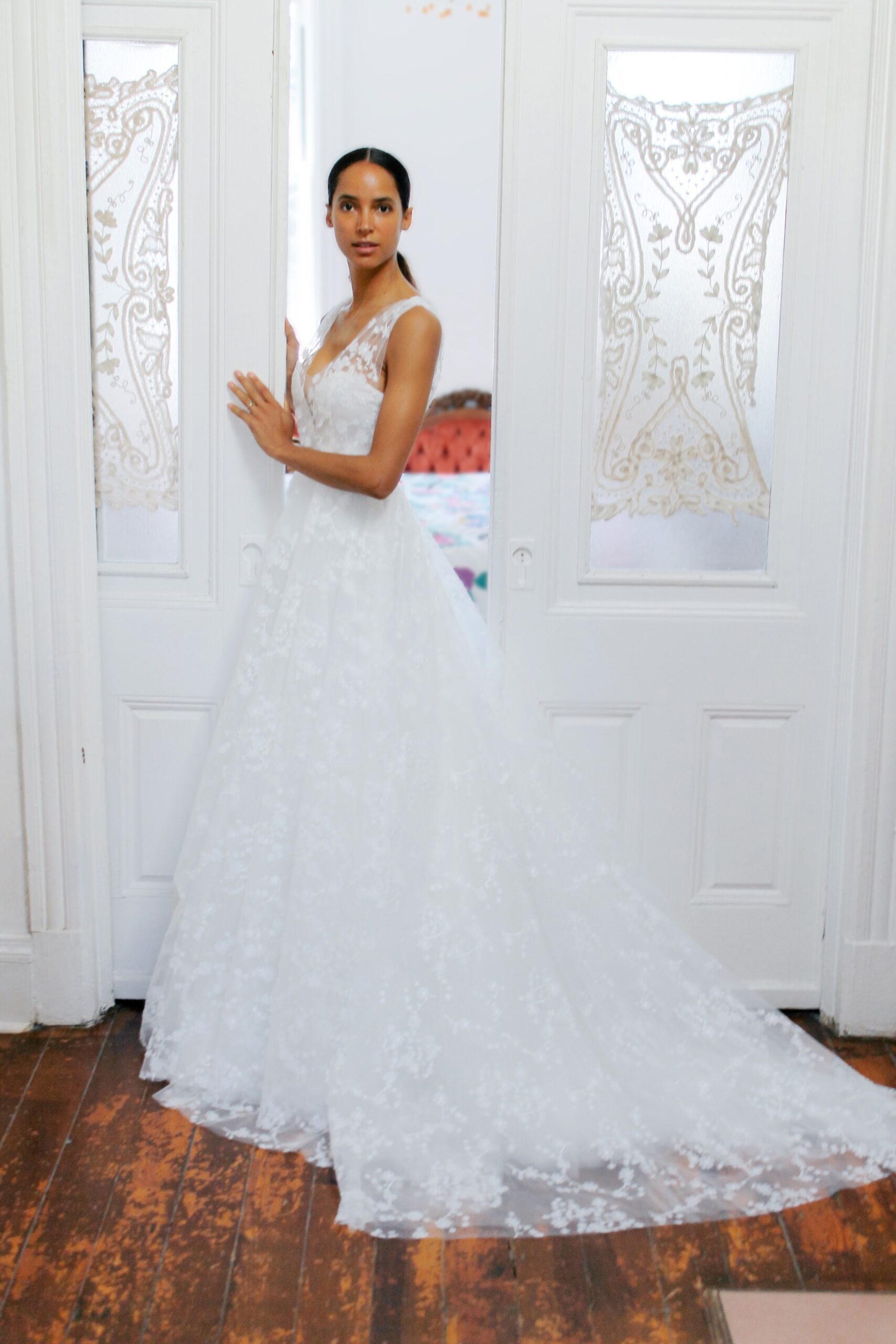 white lace sleeveless gown
