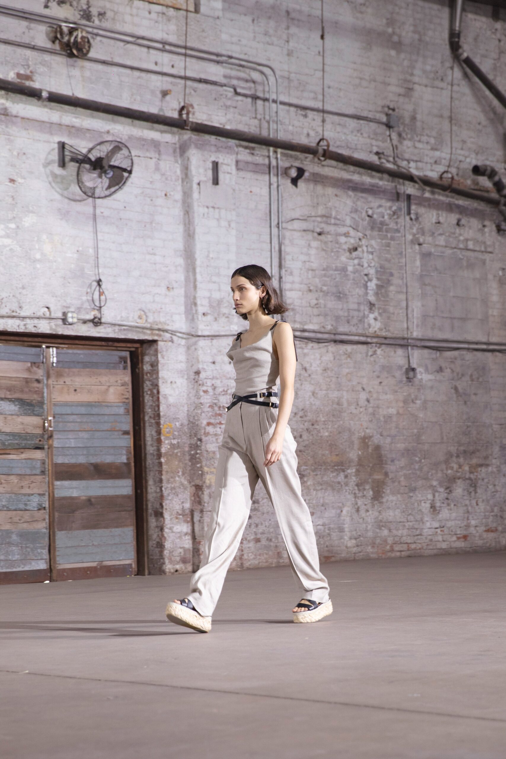 beige fitted sleeveless top with gray relaxed pants