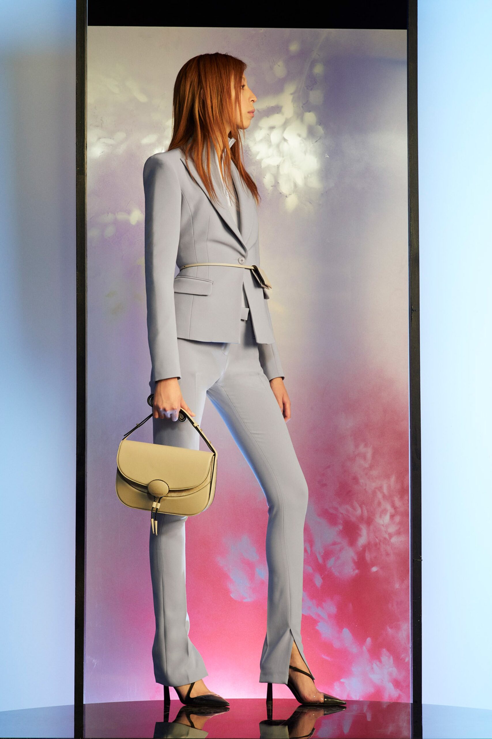 tailored blue suit with bag