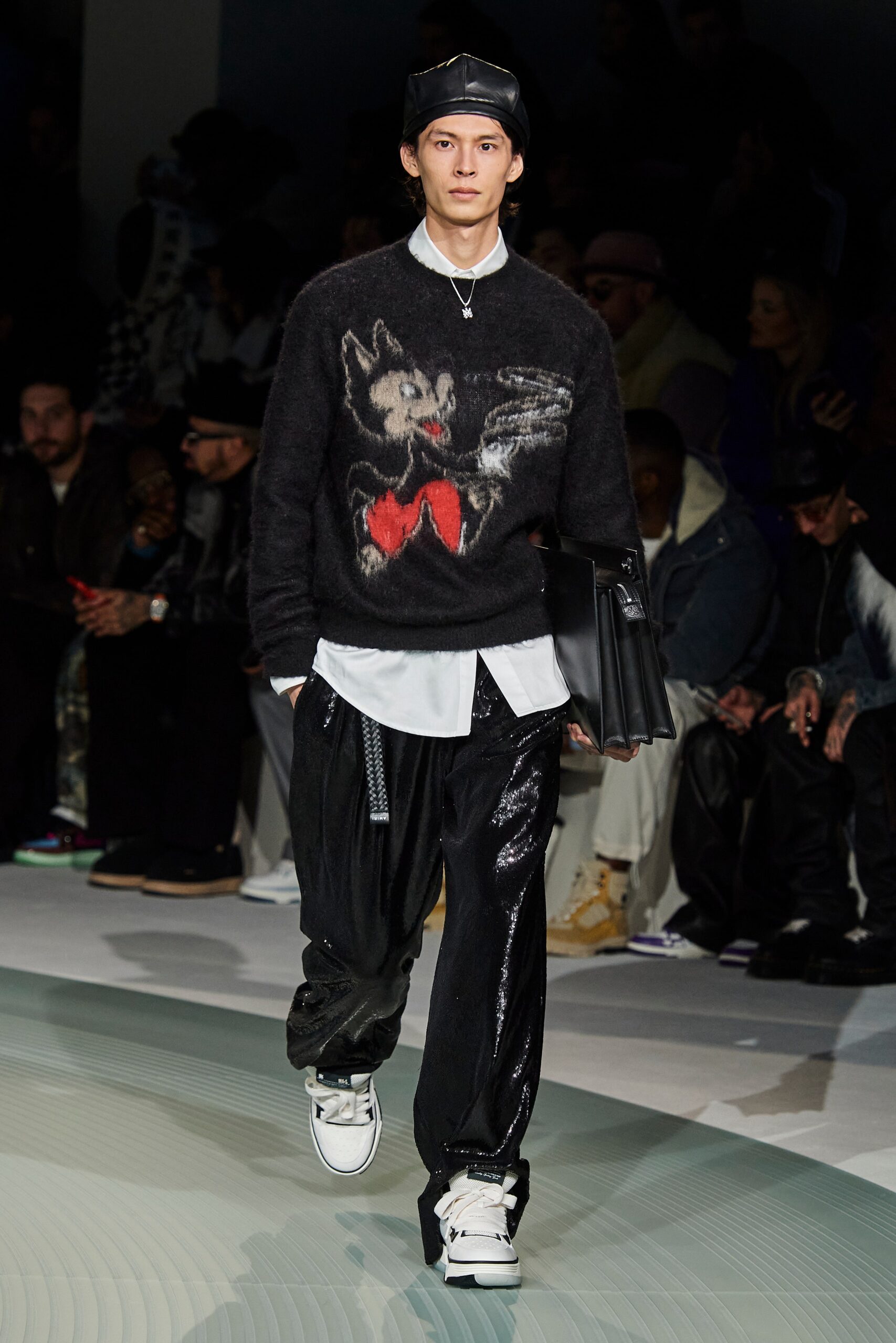 black relaxed sweater with printed design