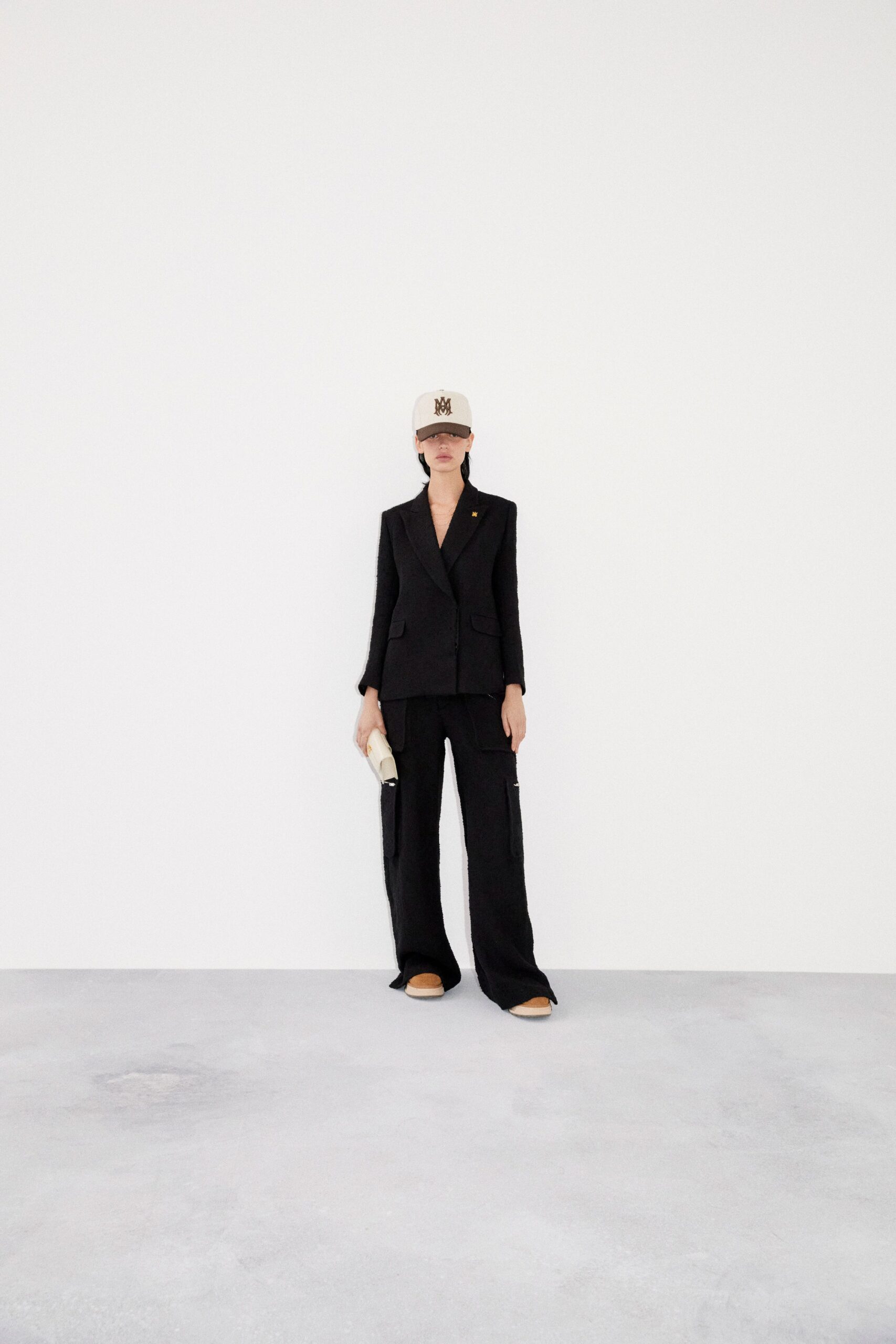 black tailored suit with cargo pants