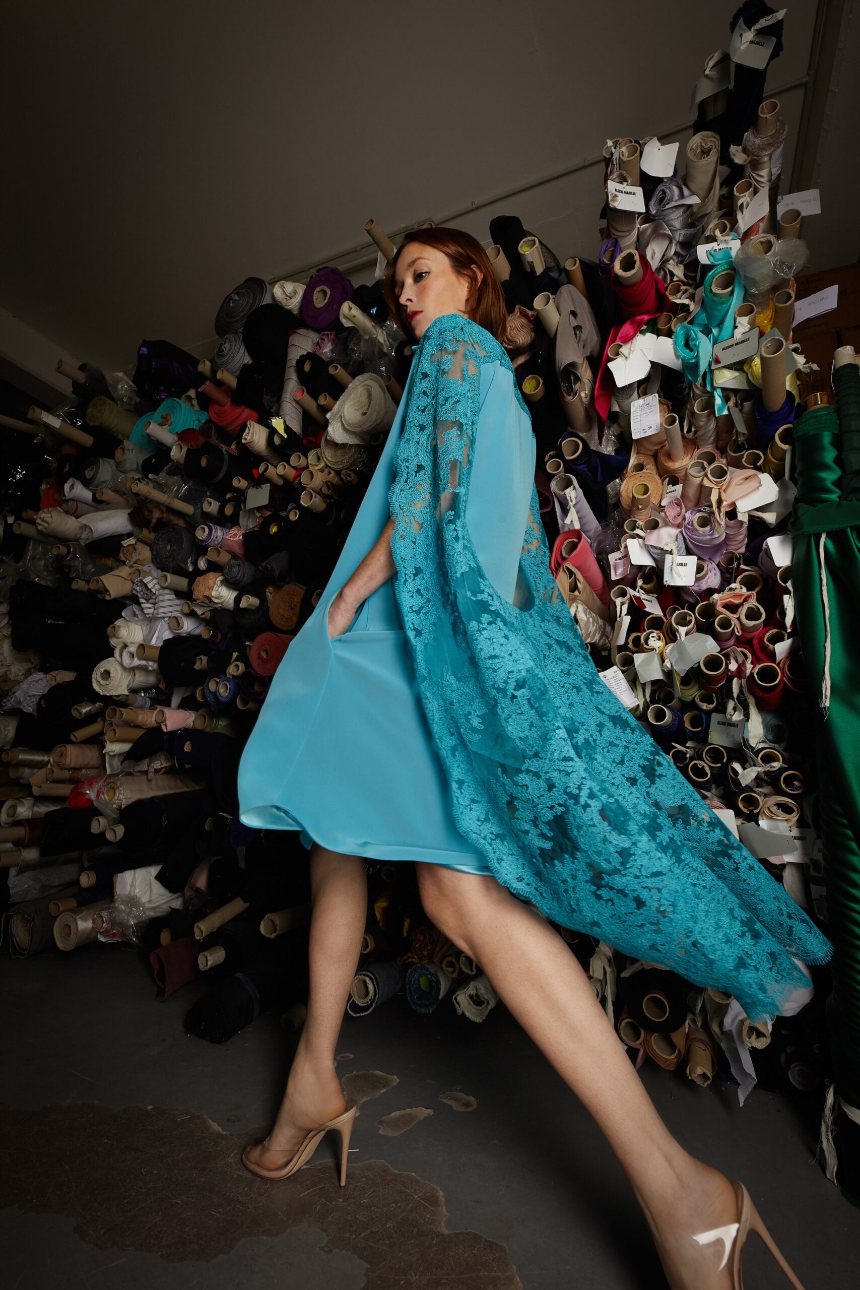 blue silk mini dress with teal lace cape