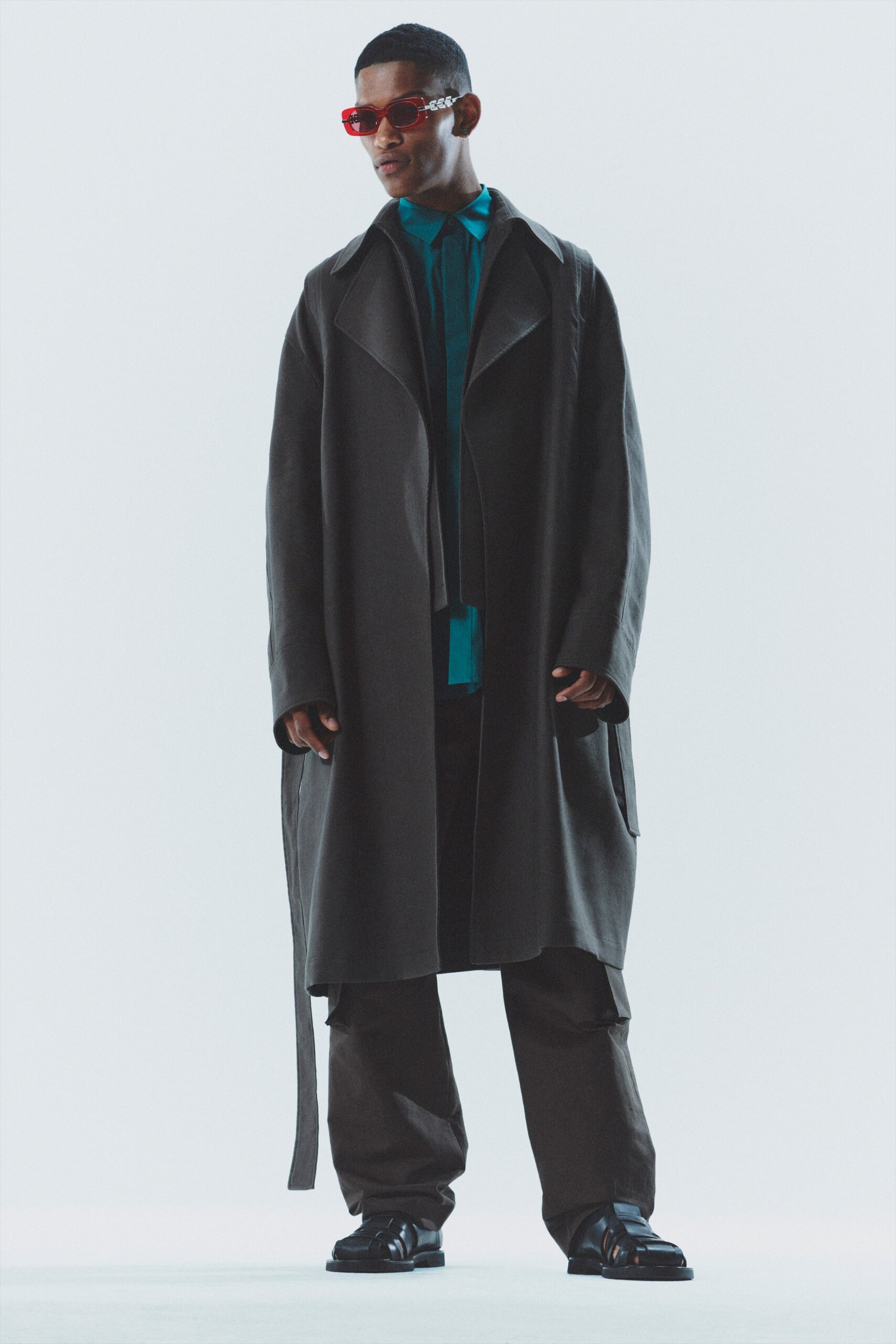 black wool coat with blue shirt