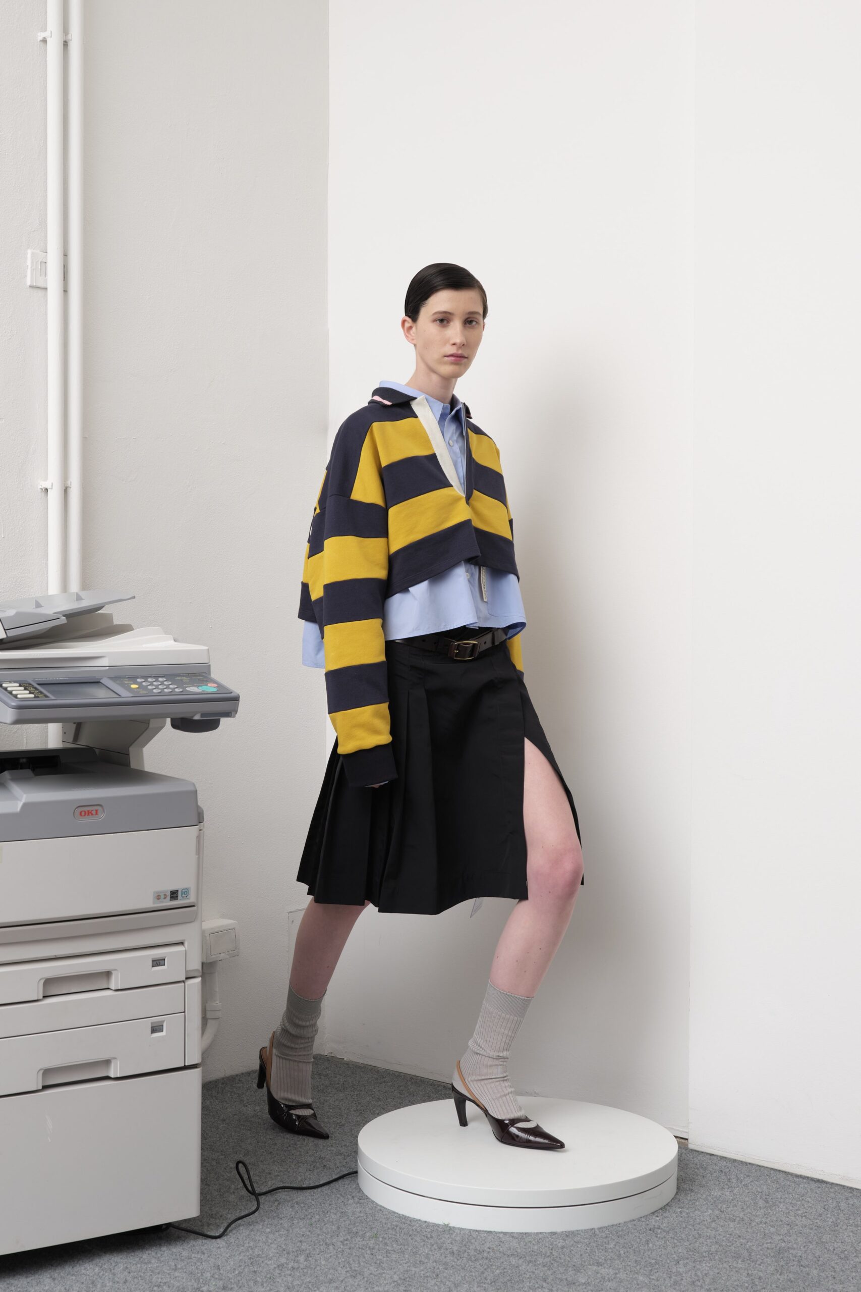 relaxed color-blocked jacket with fitted shirt and skirt