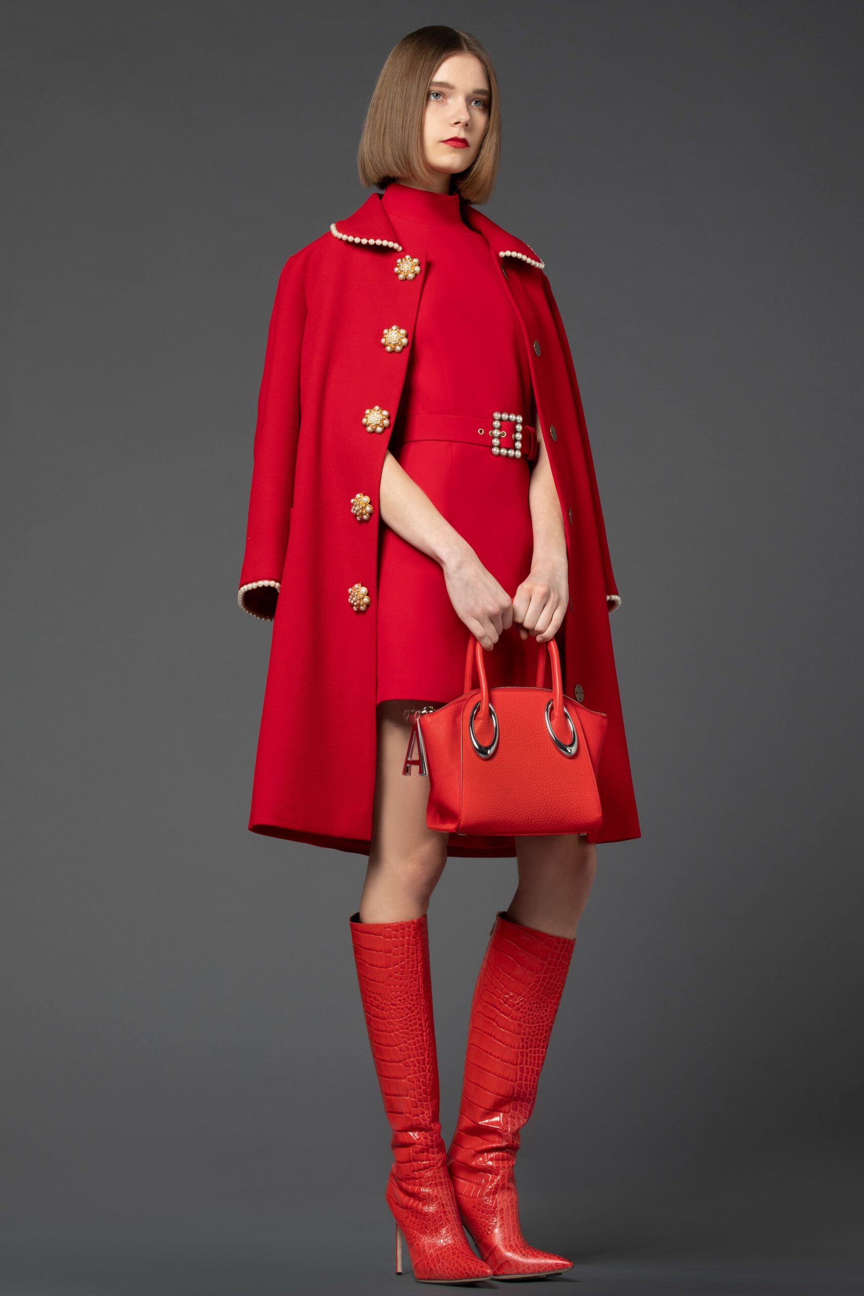 red long-sleeve collared fitted buttoned coat