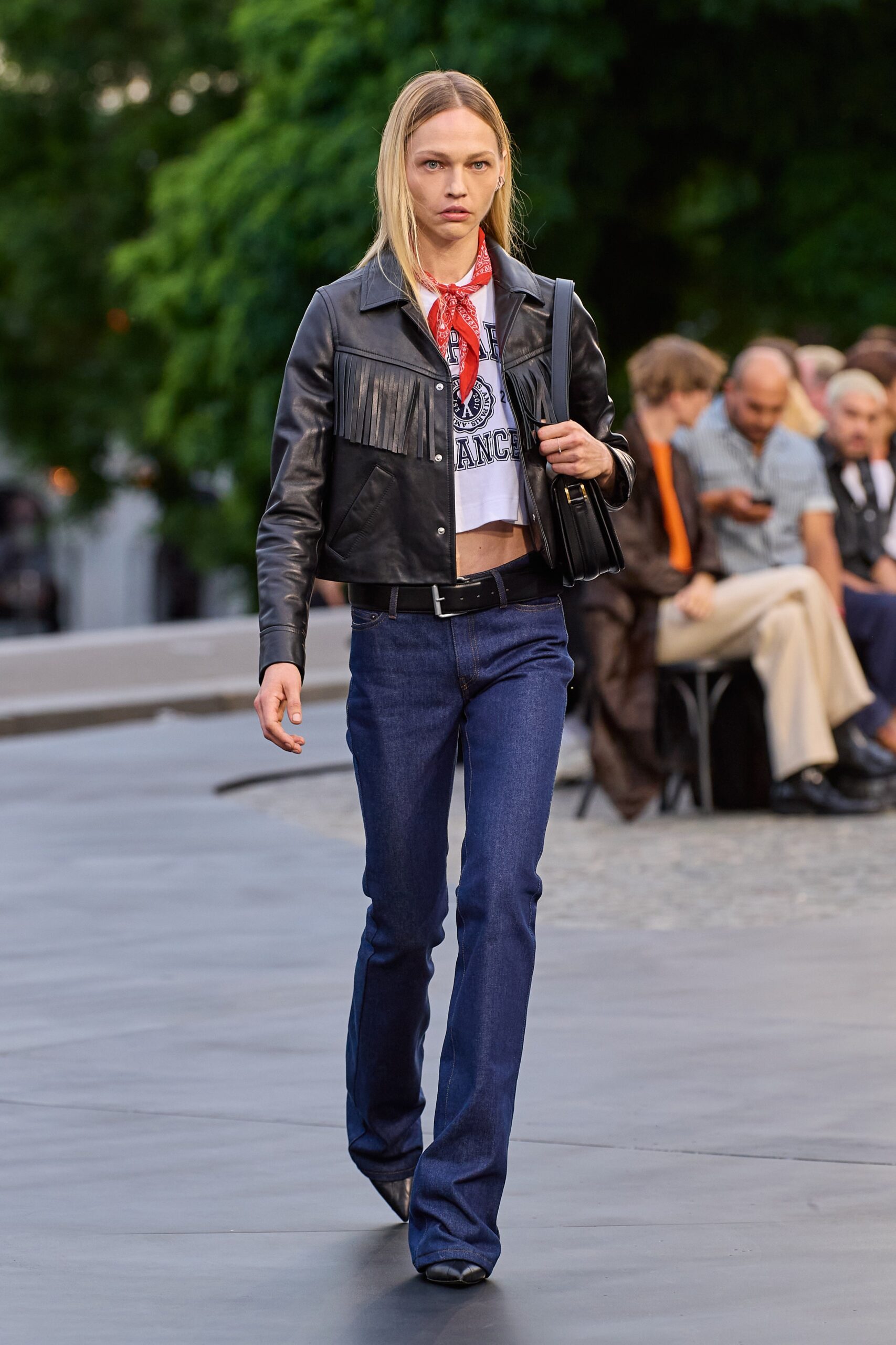 black leather jacket with flared jeans