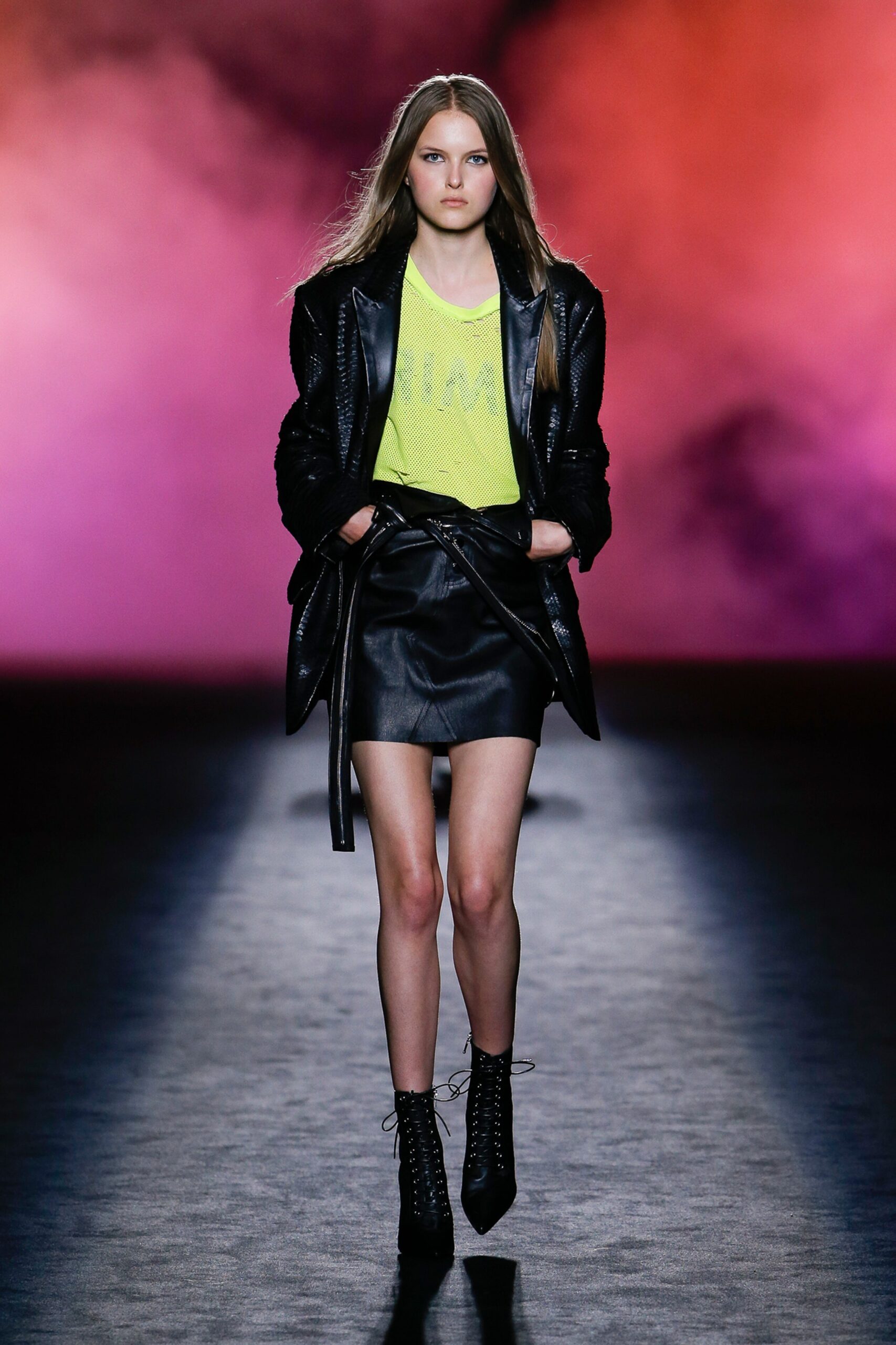 black leather jacket with yellow top
