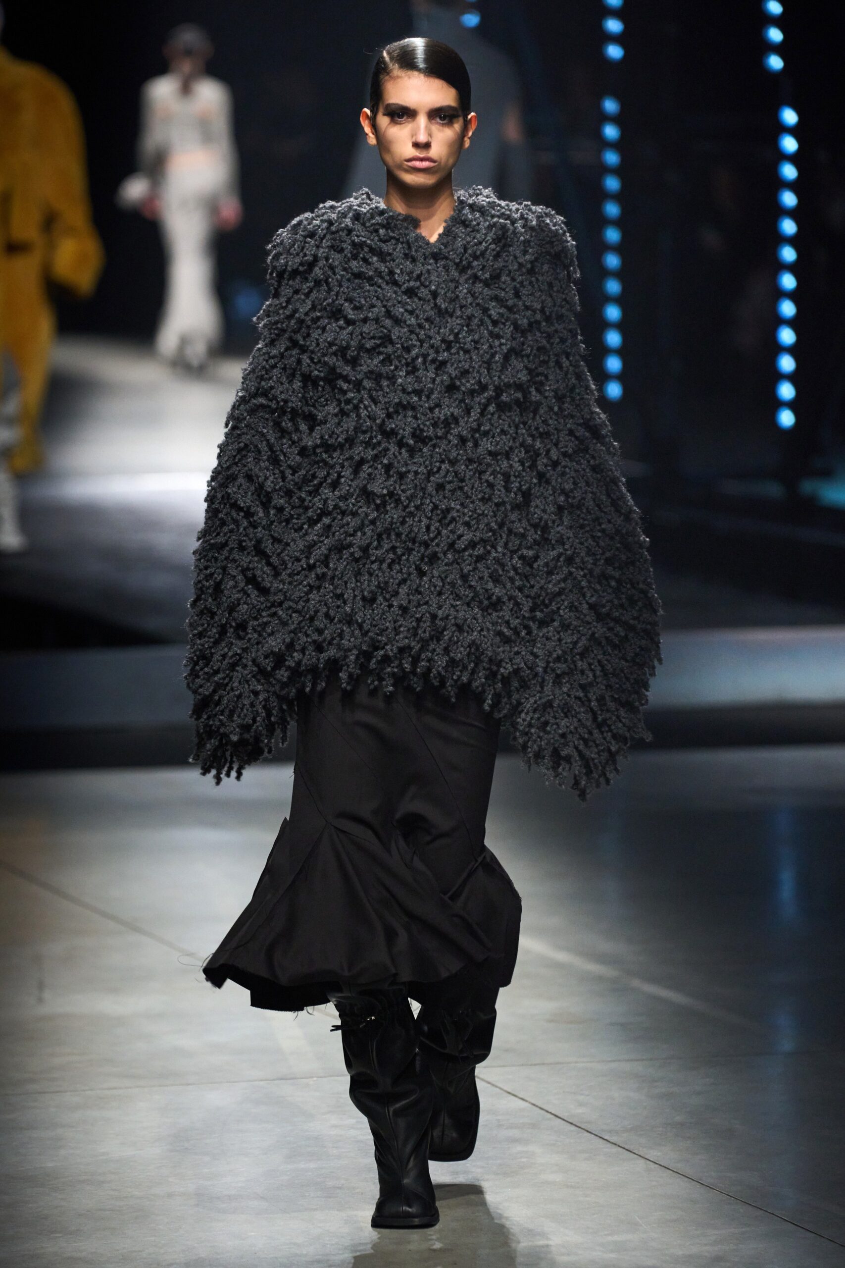 black wool sleeveless relaxed textured poncho