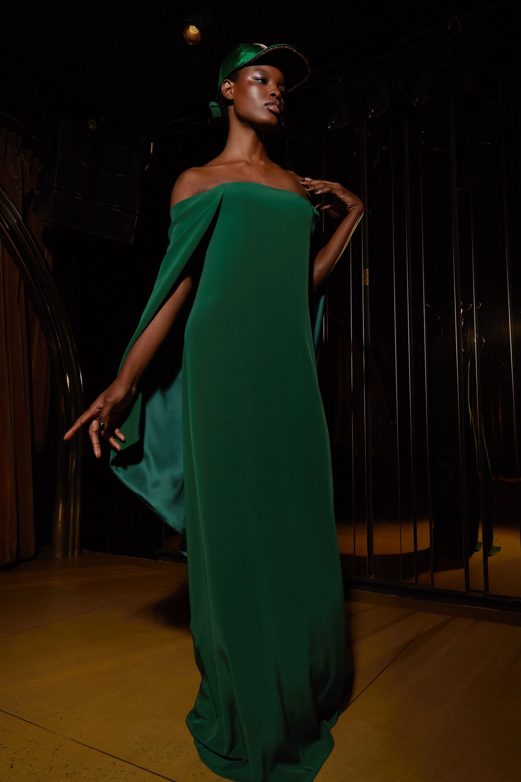 green silk off-shoulder gown